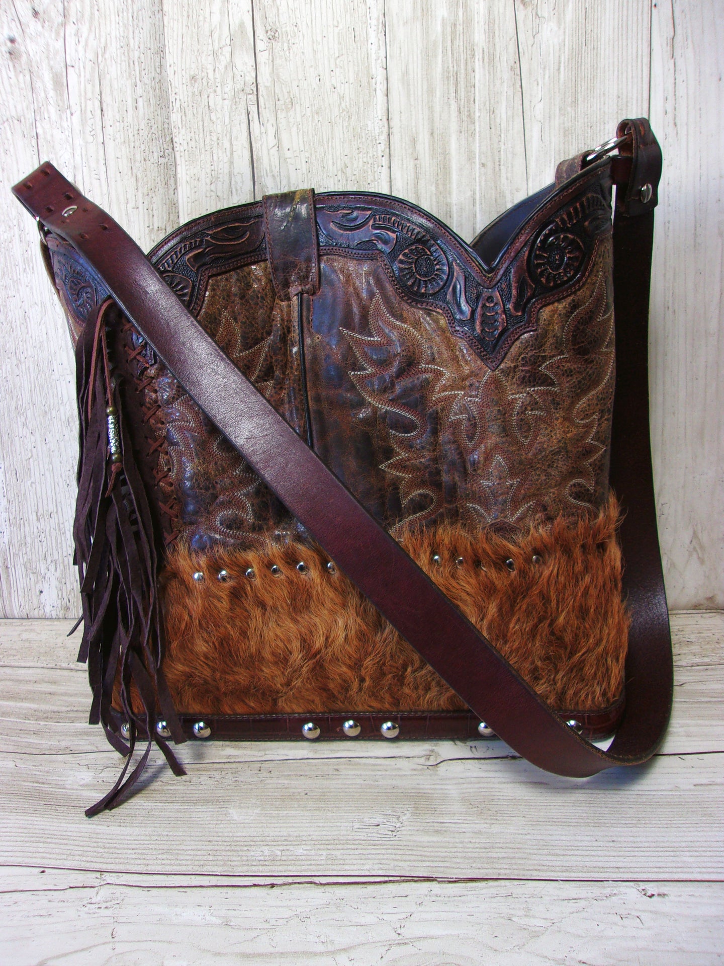 Top Shelf Cowboy Boot Purse with Fringe TS294 handcrafted from cowboy boots. Shop Handbags at ChrisThompsonBags.com and buy the best boot top purse, Country Chic, country fashion, country style, cowboy boot lover, cowboy boot purse, Cowgirl Chic, cowgirl style, luxury handbag, rodeo purse, western chic, western fashion, western style at Chris Thompson Bags.