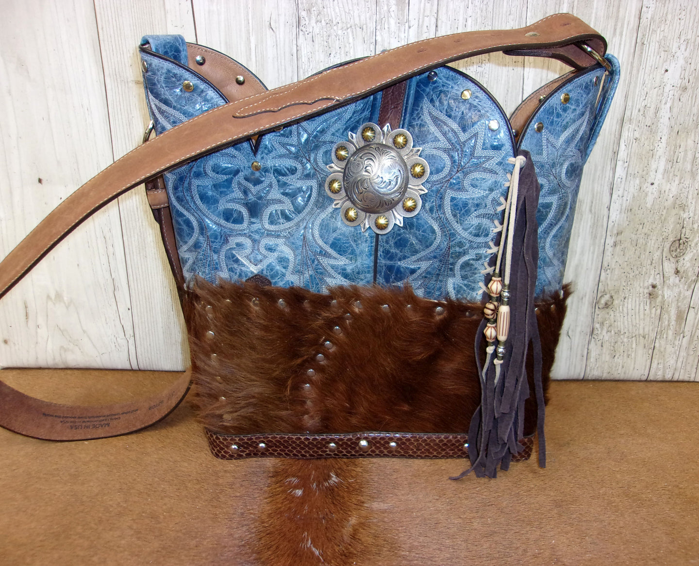 Top Shelf Cowboy Boot Purse with Fringe TS300 handcrafted from cowboy boots. Shop Handbags at ChrisThompsonBags.com and buy the best boot top purse, Country Chic, country fashion, country style, cowboy boot lover, cowboy boot purse, Cowgirl Chic, cowgirl style, luxury handbag, rodeo purse, western chic, western fashion, western style at Chris Thompson Bags.