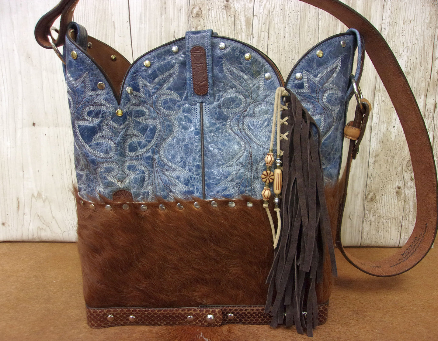 Top Shelf Cowboy Boot Purse with Fringe TS300 handcrafted from cowboy boots. Shop Handbags at ChrisThompsonBags.com and buy the best boot top purse, Country Chic, country fashion, country style, cowboy boot lover, cowboy boot purse, Cowgirl Chic, cowgirl style, luxury handbag, rodeo purse, western chic, western fashion, western style at Chris Thompson Bags.