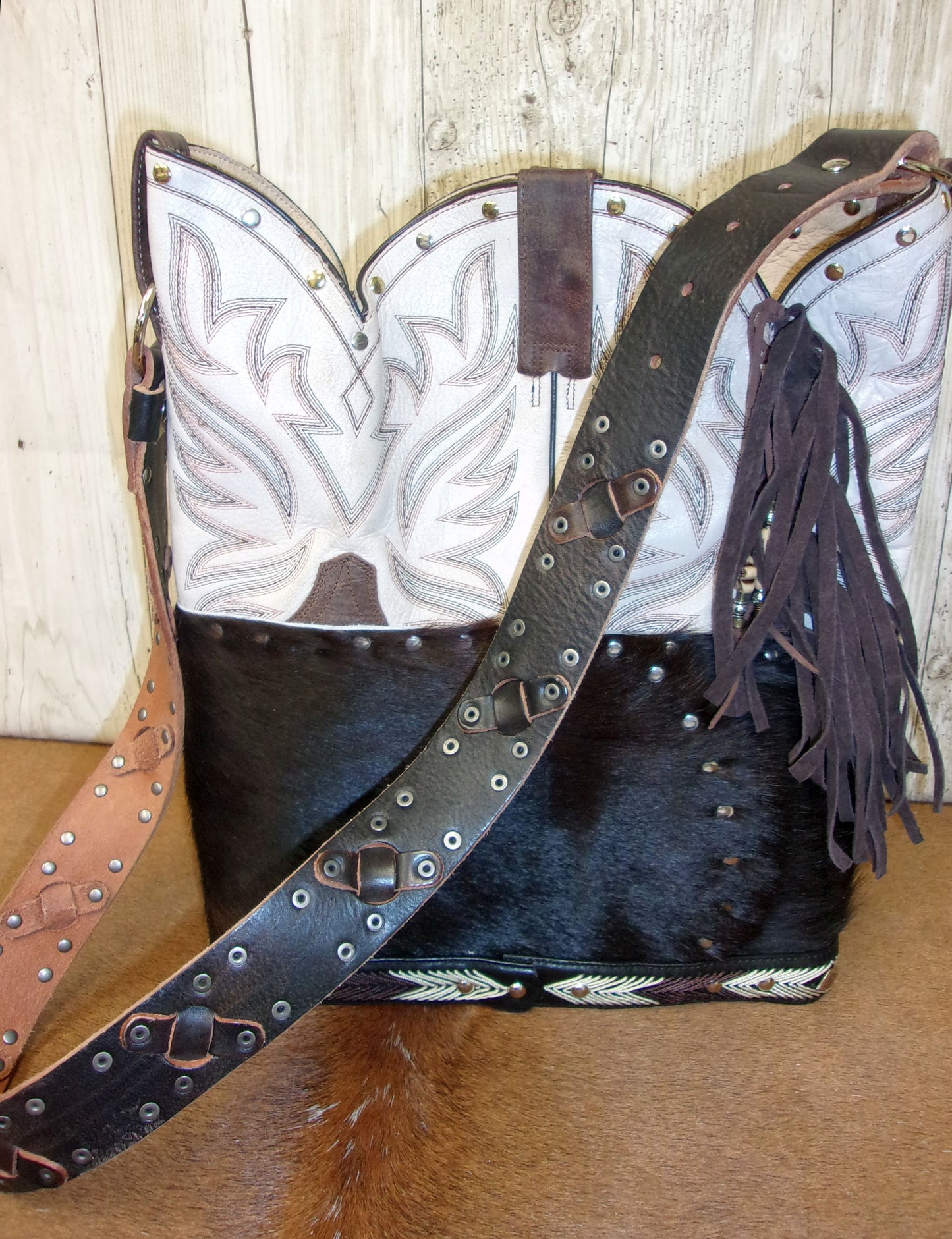 Top Shelf Cowboy Boot Purse with Fringe TS304 handcrafted from cowboy boots. Shop Handbags at ChrisThompsonBags.com and buy the best boot top purse, Country Chic, country fashion, country style, cowboy boot lover, cowboy boot purse, Cowgirl Chic, cowgirl style, luxury handbag, rodeo purse, western chic, western fashion, western style at Chris Thompson Bags.