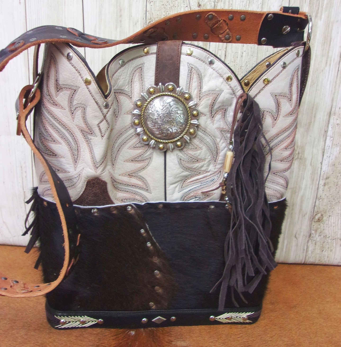 Top Shelf Cowboy Boot Purse with Fringe TS304 handcrafted from cowboy boots. Shop Handbags at ChrisThompsonBags.com and buy the best boot top purse, Country Chic, country fashion, country style, cowboy boot lover, cowboy boot purse, Cowgirl Chic, cowgirl style, luxury handbag, rodeo purse, western chic, western fashion, western style at Chris Thompson Bags.