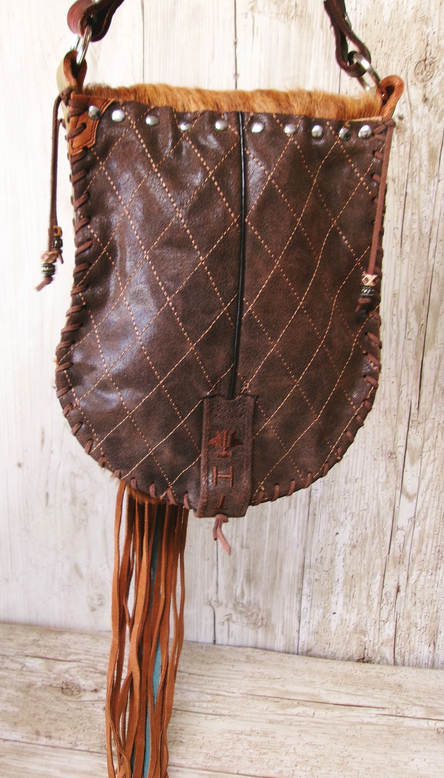 Boho Bag with Fringe BB01 handcrafted from cowboy boots. Shop  at ChrisThompsonBags.com and buy the best ["fringe","hair on hide","handpainted"] at Chris Thompson Bags.