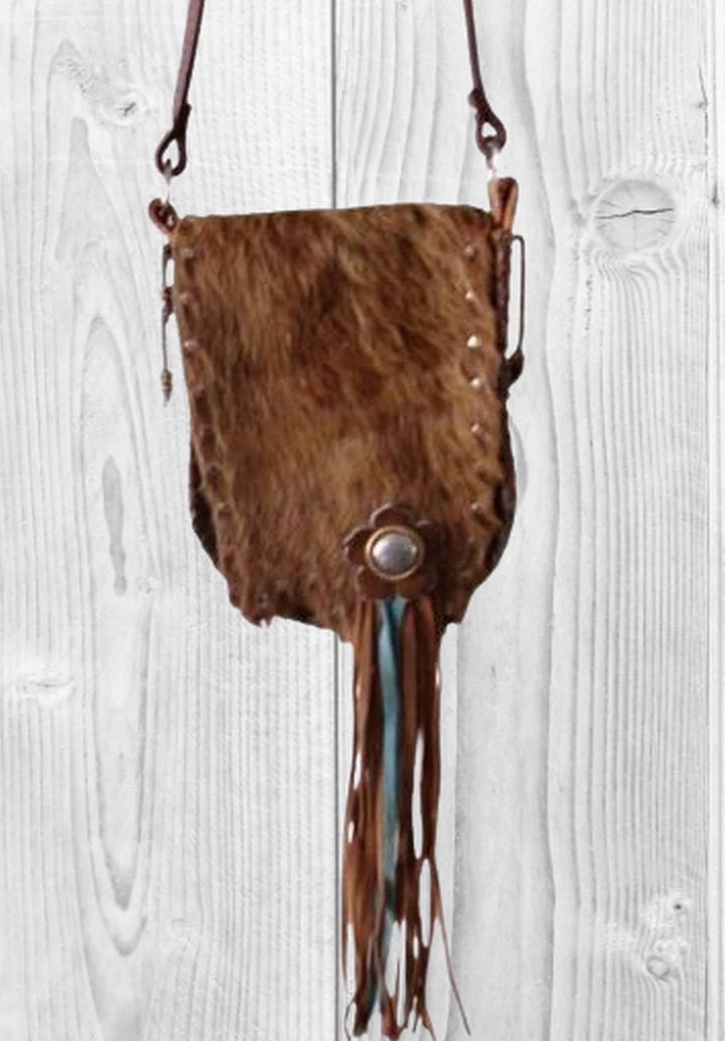 Boho Bag with Fringe BB01 handcrafted from cowboy boots. Shop  at ChrisThompsonBags.com and buy the best ["fringe","hair on hide","handpainted"] at Chris Thompson Bags.