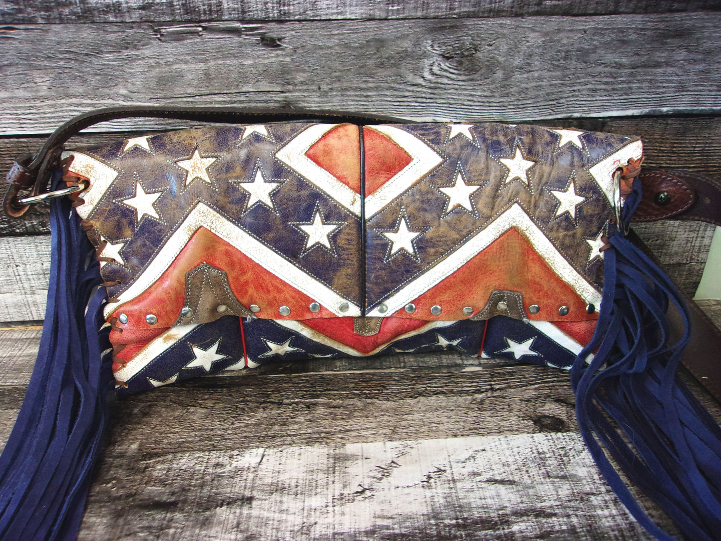 Clutch Cowboy Boot Purse CL01 handcrafted from cowboy boots. Shop Handbags at ChrisThompsonBags.com and buy the best ["Clutch","Crossbody","fringe","Medium"] at Chris Thompson Bags.
