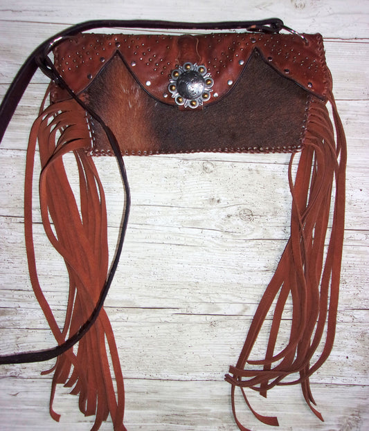 Clutch Cowboy Boot Purse CL16 handcrafted from cowboy boots. Shop Handbags at ChrisThompsonBags.com and buy the best ["brown","Clutch","Crossbody","fringe","Hide","Medium"] at Chris Thompson Bags.