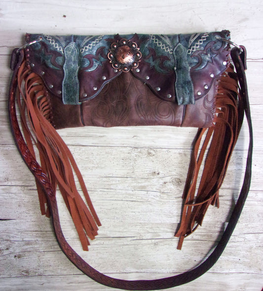 Clutch Cowboy Boot Purse CL18 handcrafted from cowboy boots. Shop Handbags at ChrisThompsonBags.com and buy the best ["Blue","brown","Clutch","Crossbody","fringe","Medium"] at Chris Thompson Bags.