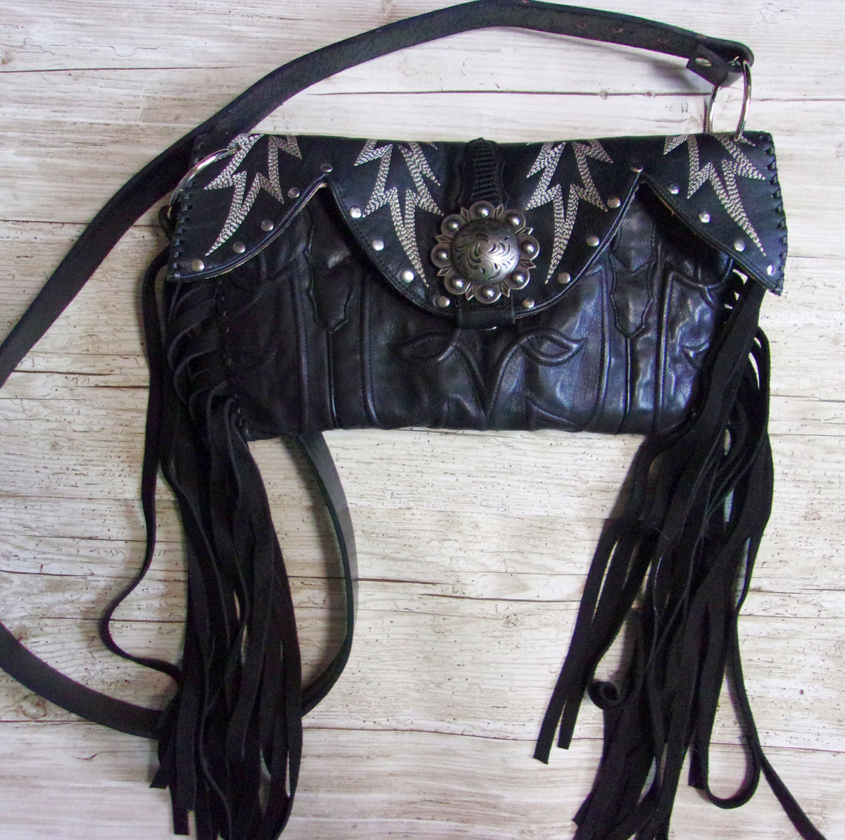 Clutch Cowboy Boot Purse CL19 handcrafted from cowboy boots. Shop Handbags at ChrisThompsonBags.com and buy the best ["Black","Clutch","Crossbody","fringe","Medium"] at Chris Thompson Bags.