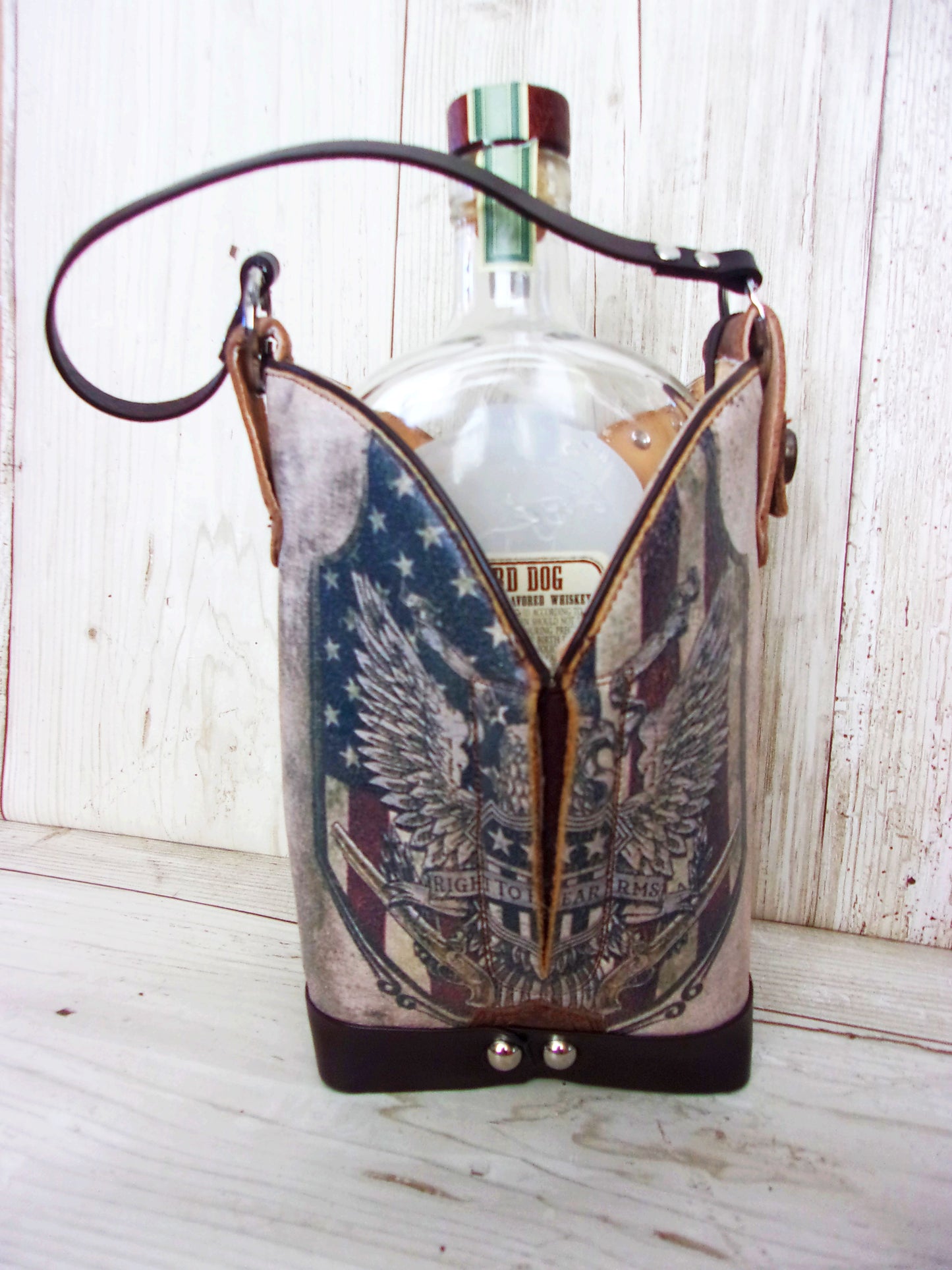 Cowboy Boot Whiskey Tote CR206 handcrafted from cowboy boots. Shop Barware at ChrisThompsonBags.com and buy the best country bridesmaid, country wedding gift, cowboy gift, cowgirl gift, cowgirl party bag, crown royal tote, groomsman gift, rodeo party, rustic liquor tote, western gift, western wedding gift, whiskey caddy, whiskey lover gift at Chris Thompson Bags.