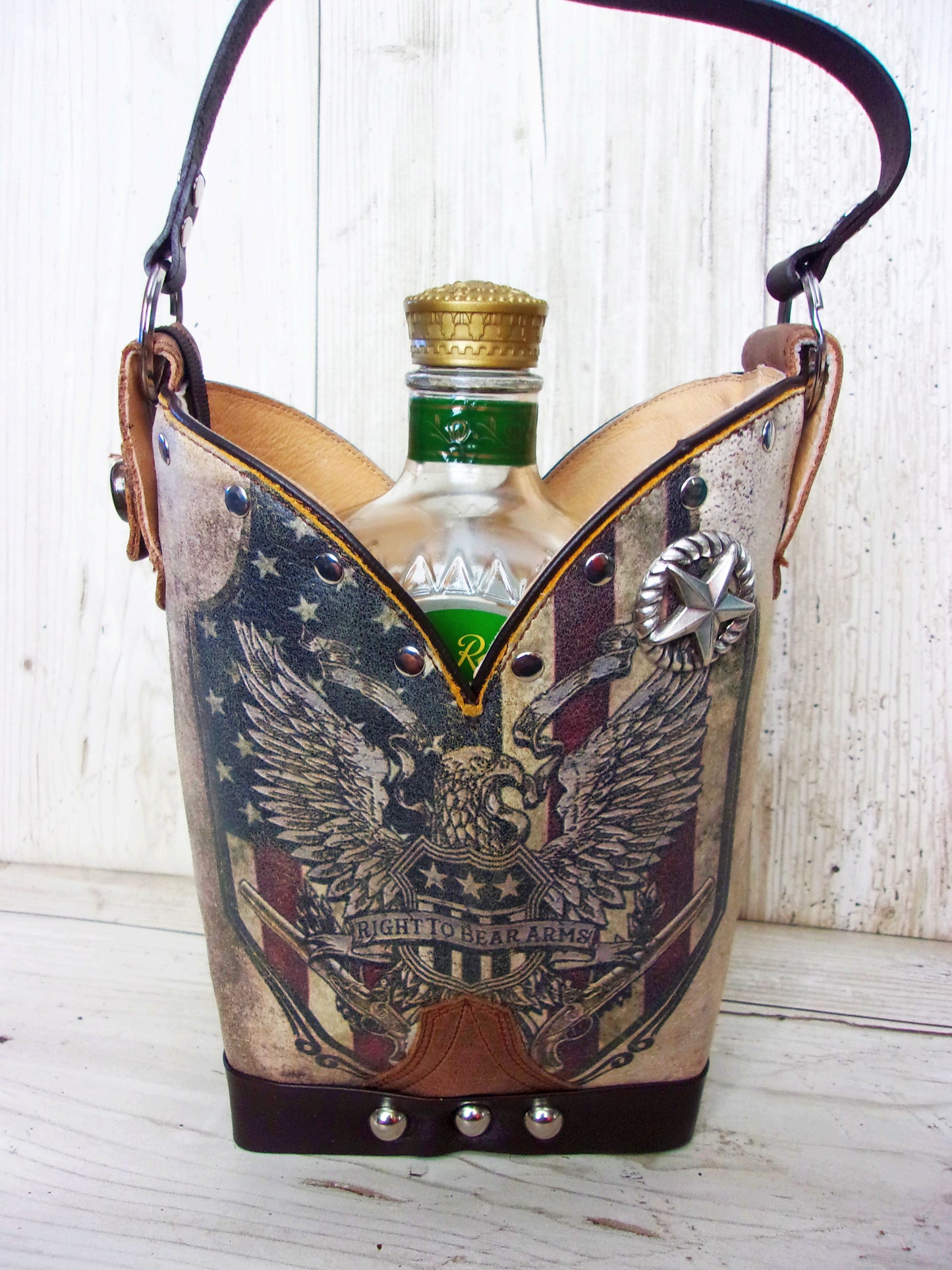 Cowboy Boot Whiskey Tote CR206 handcrafted from cowboy boots. Shop Barware at ChrisThompsonBags.com and buy the best country bridesmaid, country wedding gift, cowboy gift, cowgirl gift, cowgirl party bag, crown royal tote, groomsman gift, rodeo party, rustic liquor tote, western gift, western wedding gift, whiskey caddy, whiskey lover gift at Chris Thompson Bags.