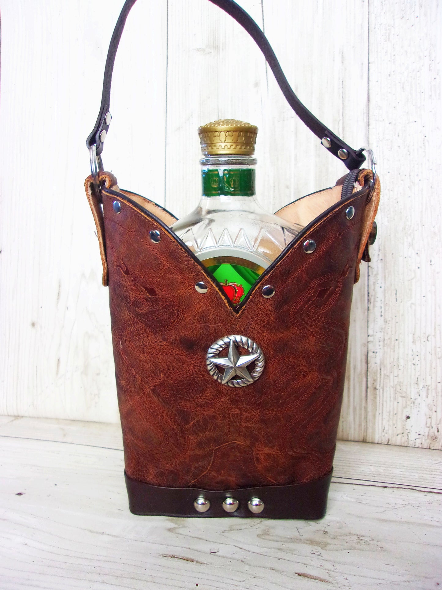 Cowboy Boot Whiskey Tote CR207 handcrafted from cowboy boots. Shop Barware at ChrisThompsonBags.com and buy the best country bridesmaid, country wedding gift, cowboy gift, cowgirl gift, cowgirl party bag, crown royal tote, groomsman gift, rodeo party, rustic liquor tote, western gift, western wedding gift, whiskey caddy, whiskey lover gift at Chris Thompson Bags.