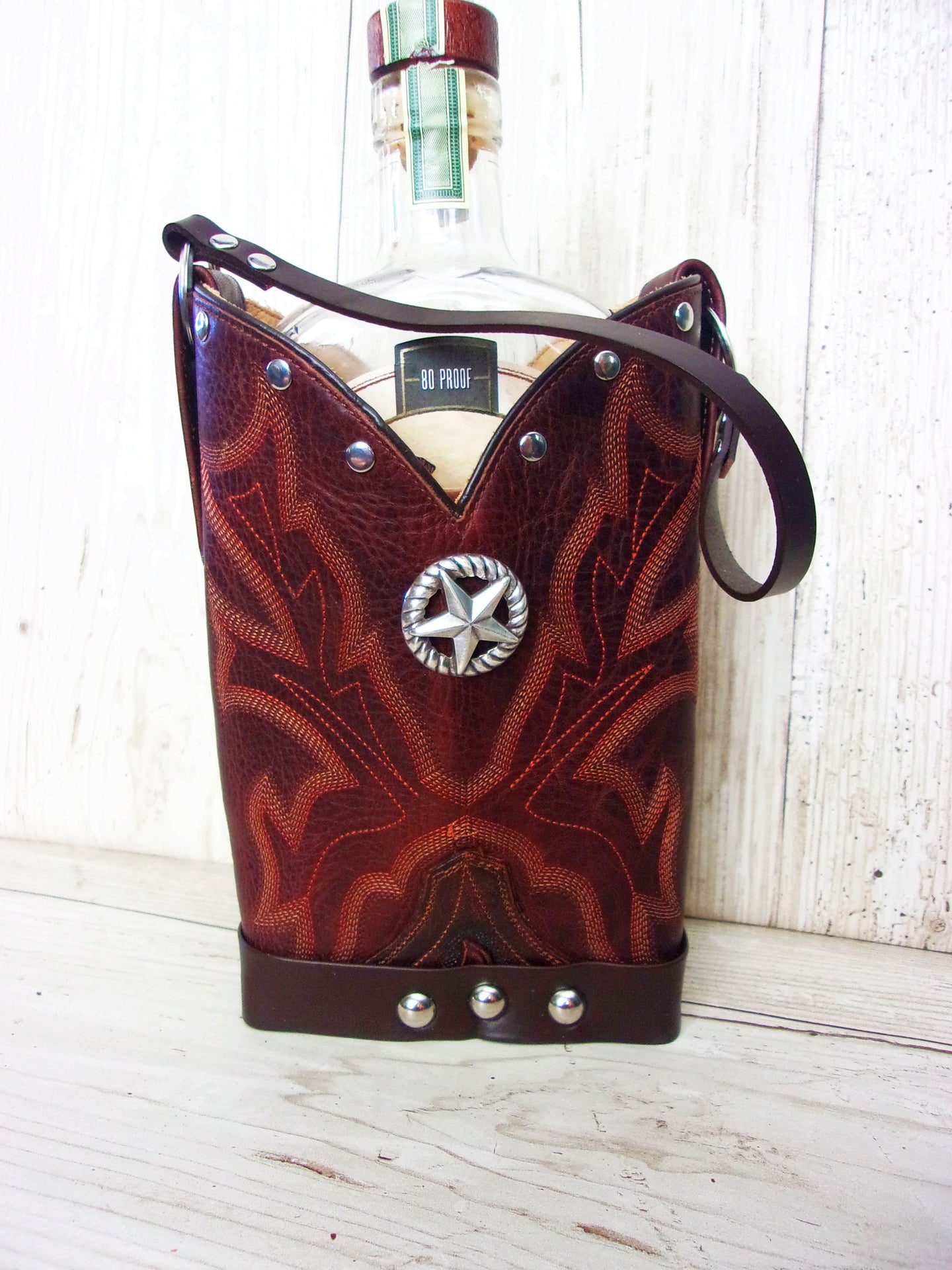 Cowboy Boot Whiskey Tote CR216 handcrafted from cowboy boots. Shop Barware at ChrisThompsonBags.com and buy the best country bridesmaid, country wedding gift, cowboy gift, cowgirl gift, cowgirl party bag, crown royal tote, groomsman gift, rodeo party, rustic liquor tote, western gift, western wedding gift, whiskey caddy, whiskey lover gift at Chris Thompson Bags.