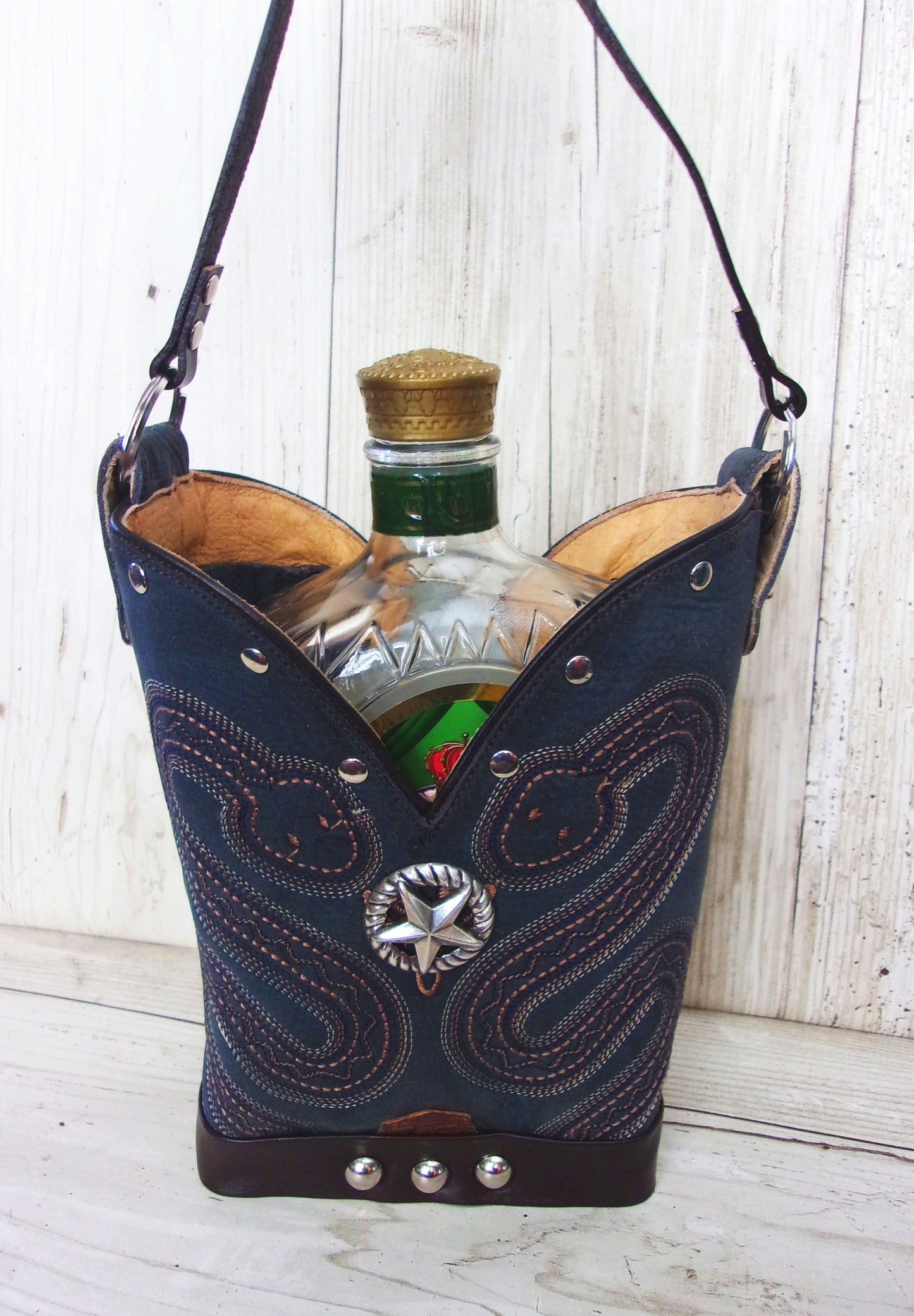 Cowboy Boot Whiskey Tote CR218 handcrafted from cowboy boots. Shop Barware at ChrisThompsonBags.com and buy the best country bridesmaid, country wedding gift, cowboy gift, cowgirl gift, cowgirl party bag, crown royal tote, groomsman gift, rodeo party, rustic liquor tote, western gift, western wedding gift, whiskey caddy, whiskey lover gift at Chris Thompson Bags.