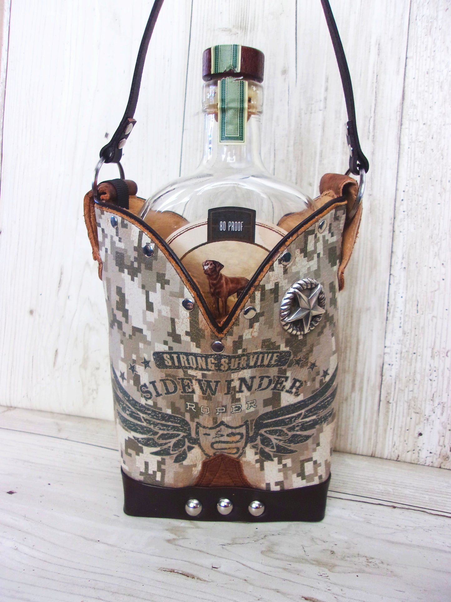 Cowboy Boot Whiskey Tote CR221 handcrafted from cowboy boots. Shop Barware at ChrisThompsonBags.com and buy the best country bridesmaid, country wedding gift, cowboy gift, cowgirl gift, cowgirl party bag, crown royal tote, groomsman gift, rodeo party, rustic liquor tote, western gift, western wedding gift, whiskey caddy, whiskey lover gift at Chris Thompson Bags.