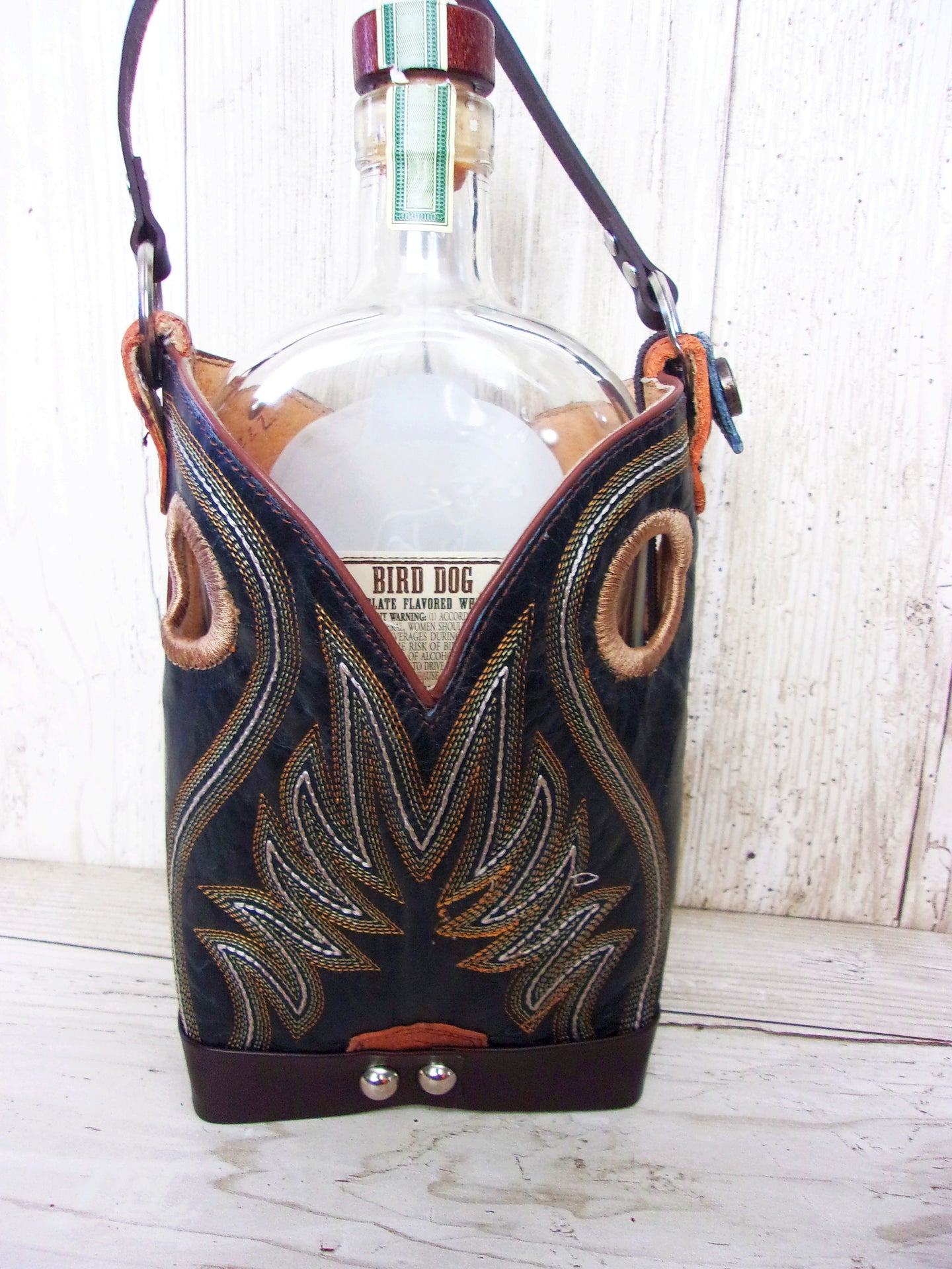 Cowboy Boot Whiskey Tote CR222 handcrafted from cowboy boots. Shop Barware at ChrisThompsonBags.com and buy the best country bridesmaid, country wedding gift, cowboy gift, cowgirl gift, cowgirl party bag, crown royal tote, groomsman gift, rodeo party, rustic liquor tote, western gift, western wedding gift, whiskey caddy, whiskey lover gift at Chris Thompson Bags.