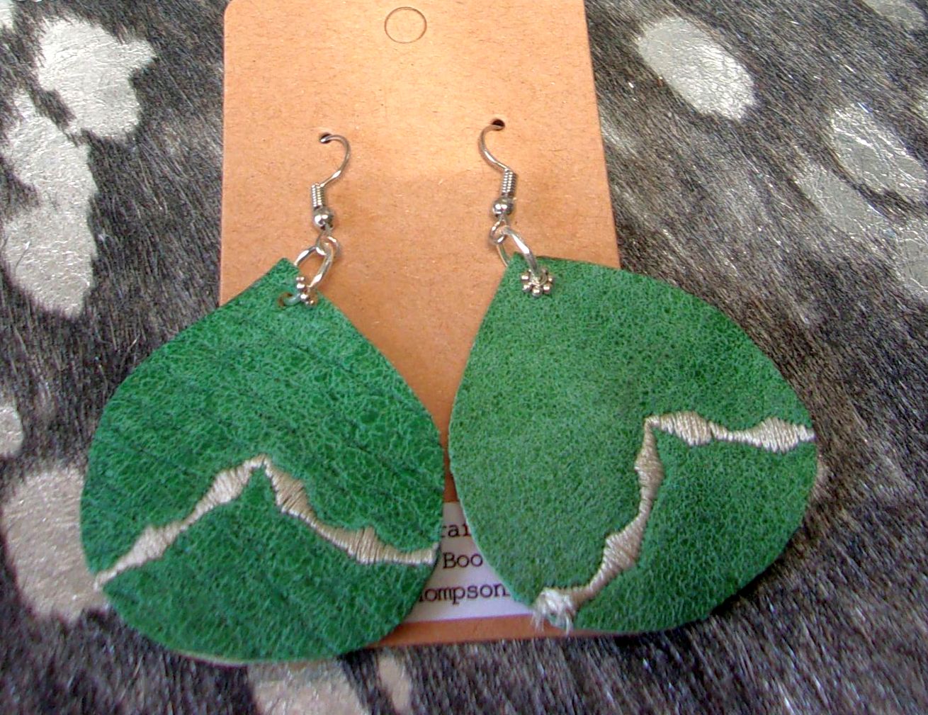 Leather Earrings ER03 handcrafted from cowboy boots. Shop jewelry at and buy the best cowboy boot scraps, cowgirl earrings, eco friendly fashion, hippie earrings, leather earrings, leather jewelry, recycled fashion, sustainable jewelry, unique earrings at Chris Thompson Bags.