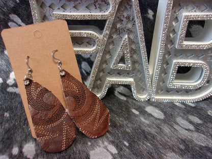 Leather Earrings ER06 handcrafted from cowboy boots. Shop jewelry at and buy the best cowboy boot scraps, cowgirl earrings, eco friendly fashion, hippie earrings, leather earrings, leather jewelry, recycled fashion, sustainable jewelry, unique earrings at Chris Thompson Bags.