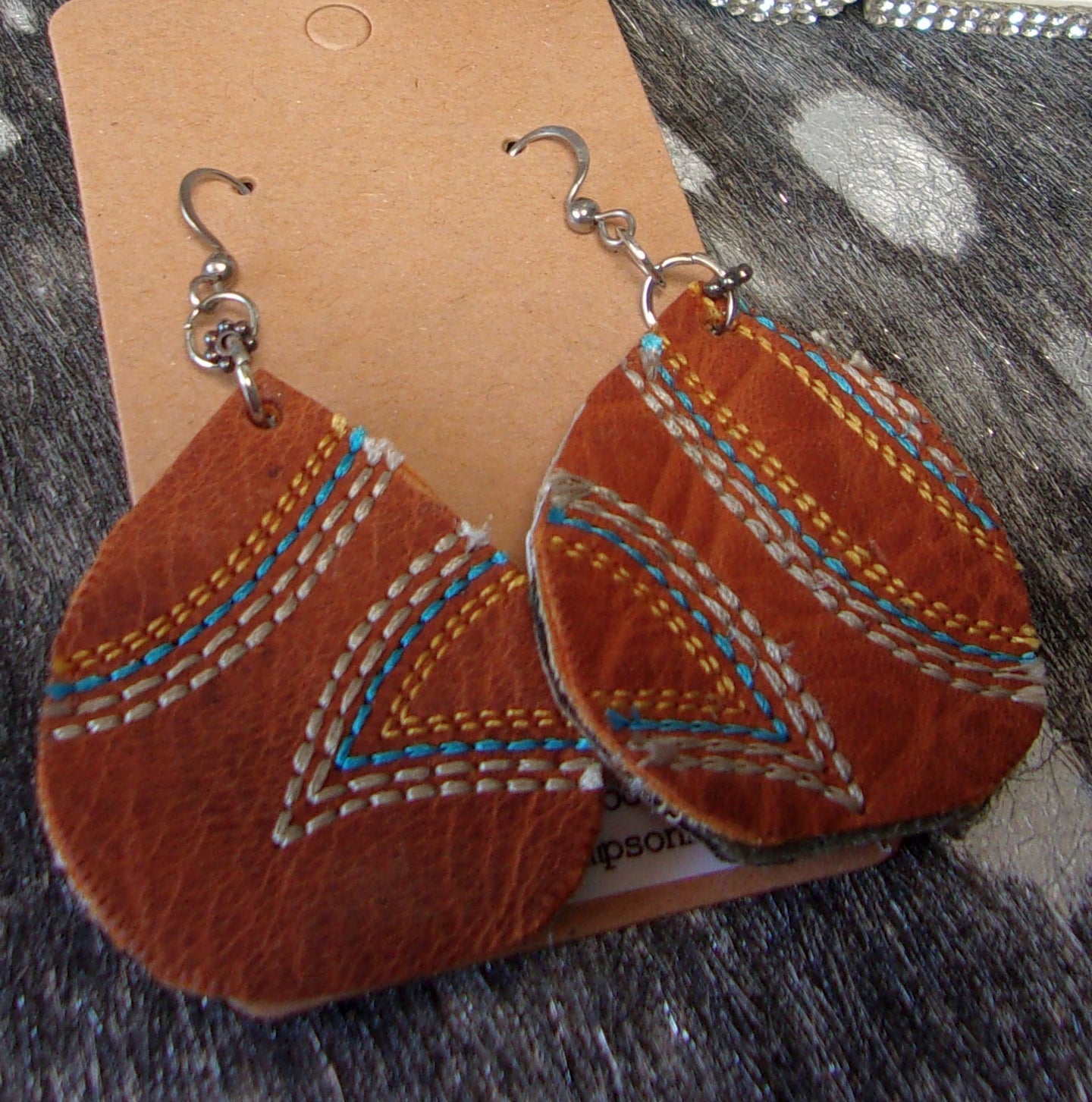 Leather Earrings ER11 handcrafted from cowboy boots. Shop jewelry at ChrisThompsonBags.com and buy the best cowboy boot scraps, cowgirl earrings, eco friendly fashion, hippie earrings, leather earrings, leather jewelry, recycled fashion, sustainable jewelry, unique earrings at Chris Thompson Bags.