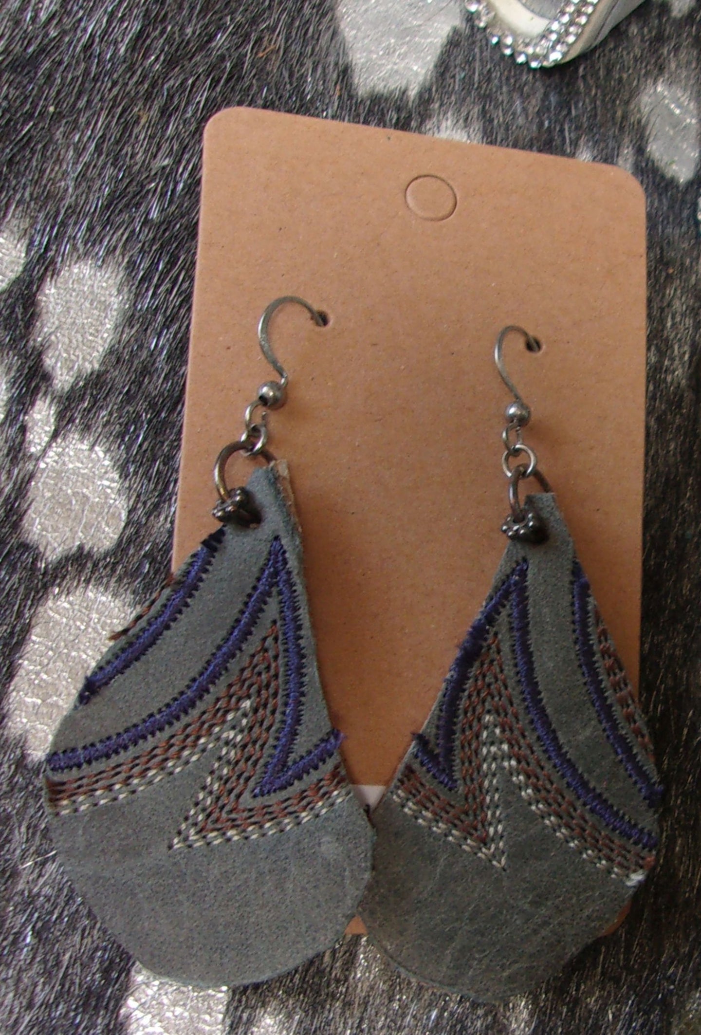 Leather Earrings ER12 handcrafted from cowboy boots. Shop jewelry at ChrisThompsonBags.com and buy the best cowboy boot scraps, cowgirl earrings, eco friendly fashion, hippie earrings, leather earrings, leather jewelry, recycled fashion, sustainable jewelry, unique earrings at Chris Thompson Bags.