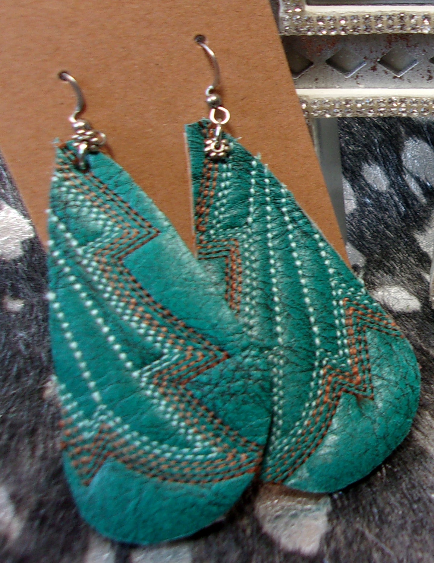 Leather Earrings ER15 handcrafted from cowboy boots. Shop jewelry at ChrisThompsonBags.com and buy the best cowboy boot scraps, cowgirl earrings, eco friendly fashion, hippie earrings, leather earrings, leather jewelry, recycled fashion, sustainable jewelry, unique earrings at Chris Thompson Bags.