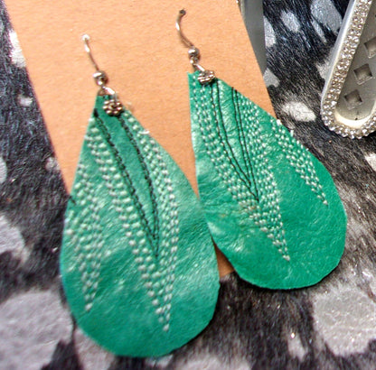 Leather Earrings ER22 handcrafted from cowboy boots. Shop jewelry at and buy the best cowboy boot scraps, cowgirl earrings, eco friendly fashion, hippie earrings, leather earrings, leather jewelry, recycled fashion, sustainable jewelry, unique earrings at Chris Thompson Bags.