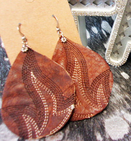 Leather Earrings ER25 handcrafted from cowboy boots. Shop jewelry at and buy the best cowboy boot scraps, cowgirl earrings, eco friendly fashion, hippie earrings, leather earrings, leather jewelry, recycled fashion, sustainable jewelry, unique earrings at Chris Thompson Bags.