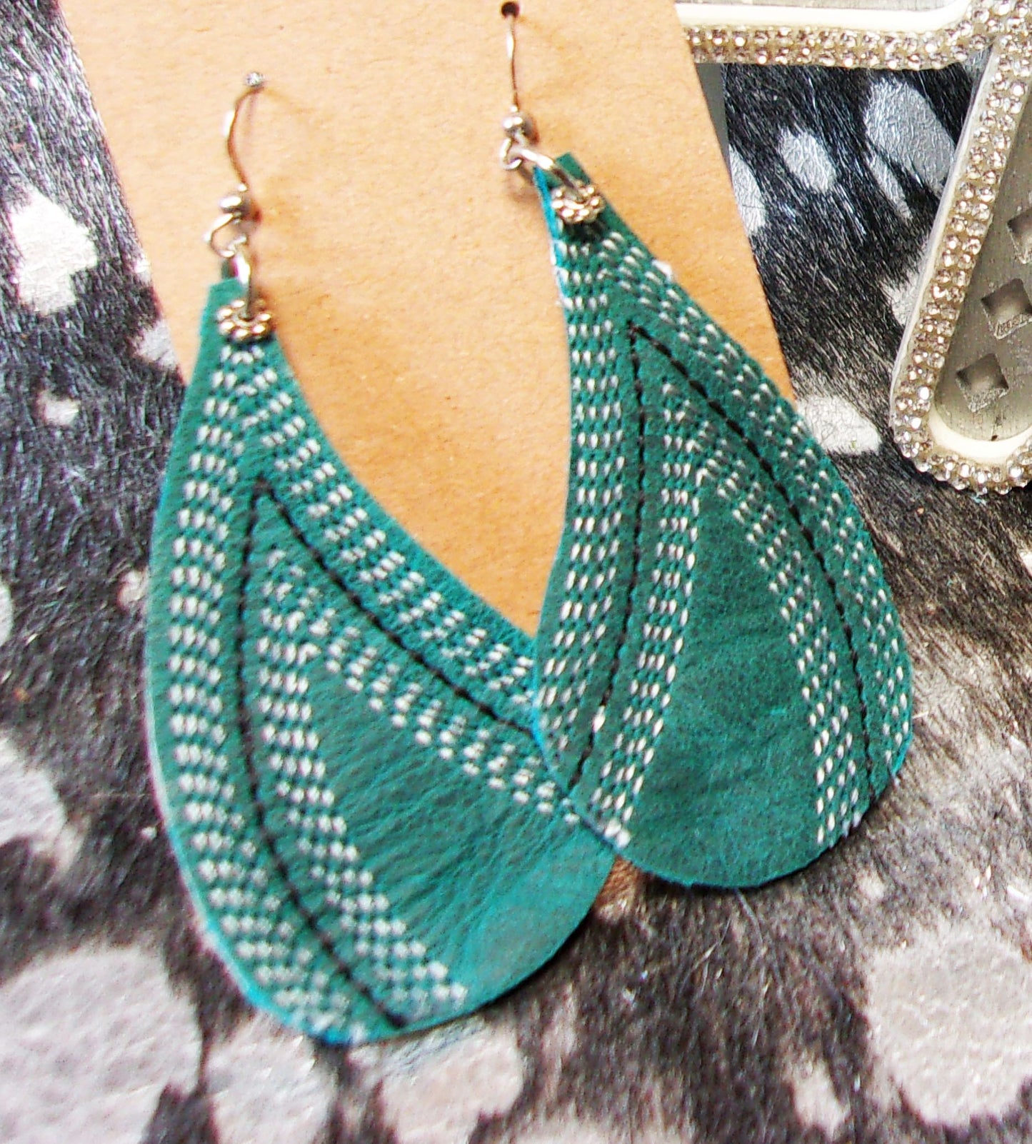 Leather Earrings ER26 handcrafted from cowboy boots. Shop jewelry at and buy the best cowboy boot scraps, cowgirl earrings, eco friendly fashion, hippie earrings, leather earrings, leather jewelry, recycled fashion, sustainable jewelry, unique earrings at Chris Thompson Bags.