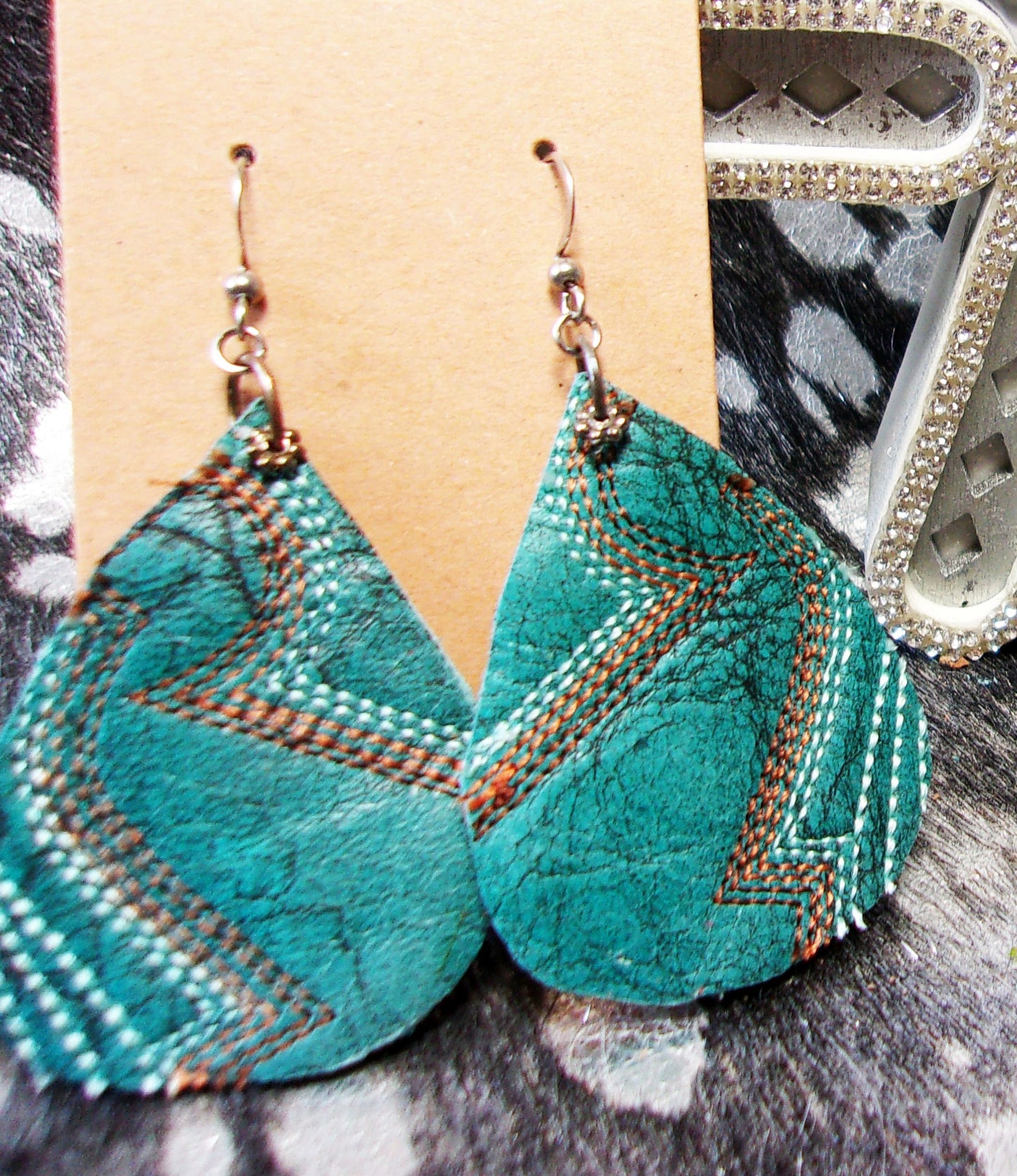 Leather Earrings ER33 handcrafted from cowboy boots. Shop jewelry at and buy the best cowboy boot scraps, cowgirl earrings, eco friendly fashion, hippie earrings, leather earrings, leather jewelry, recycled fashion, sustainable jewelry, unique earrings at Chris Thompson Bags.