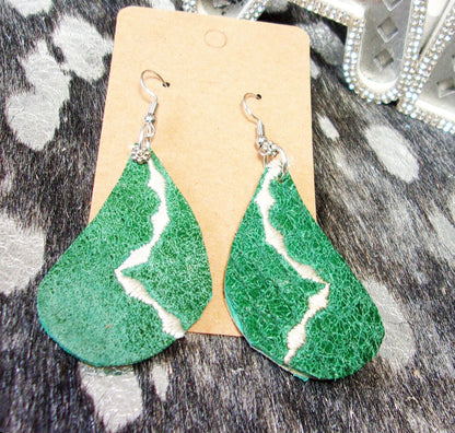 Leather Earrings ER41 handcrafted from cowboy boots. Shop jewelry at and buy the best cowboy boot scraps, cowgirl earrings, eco friendly fashion, hippie earrings, leather earrings, leather jewelry, recycled fashion, sustainable jewelry, unique earrings at Chris Thompson Bags.