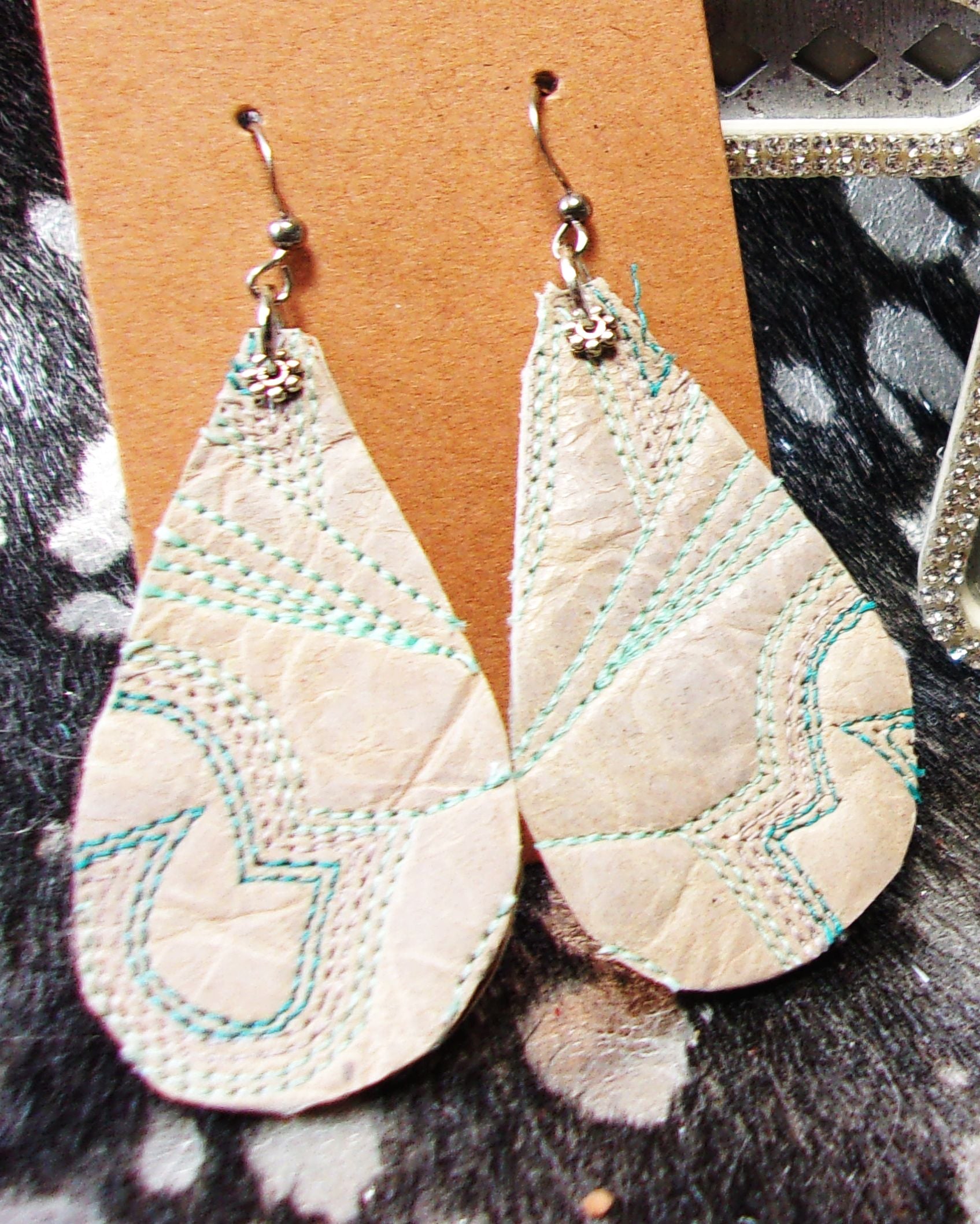 Leather Earrings ER47 handcrafted from cowboy boots. Shop jewelry at and buy the best cowboy boot scraps, cowgirl earrings, eco friendly fashion, hippie earrings, leather earrings, leather jewelry, recycled fashion, sustainable jewelry, unique earrings at Chris Thompson Bags.