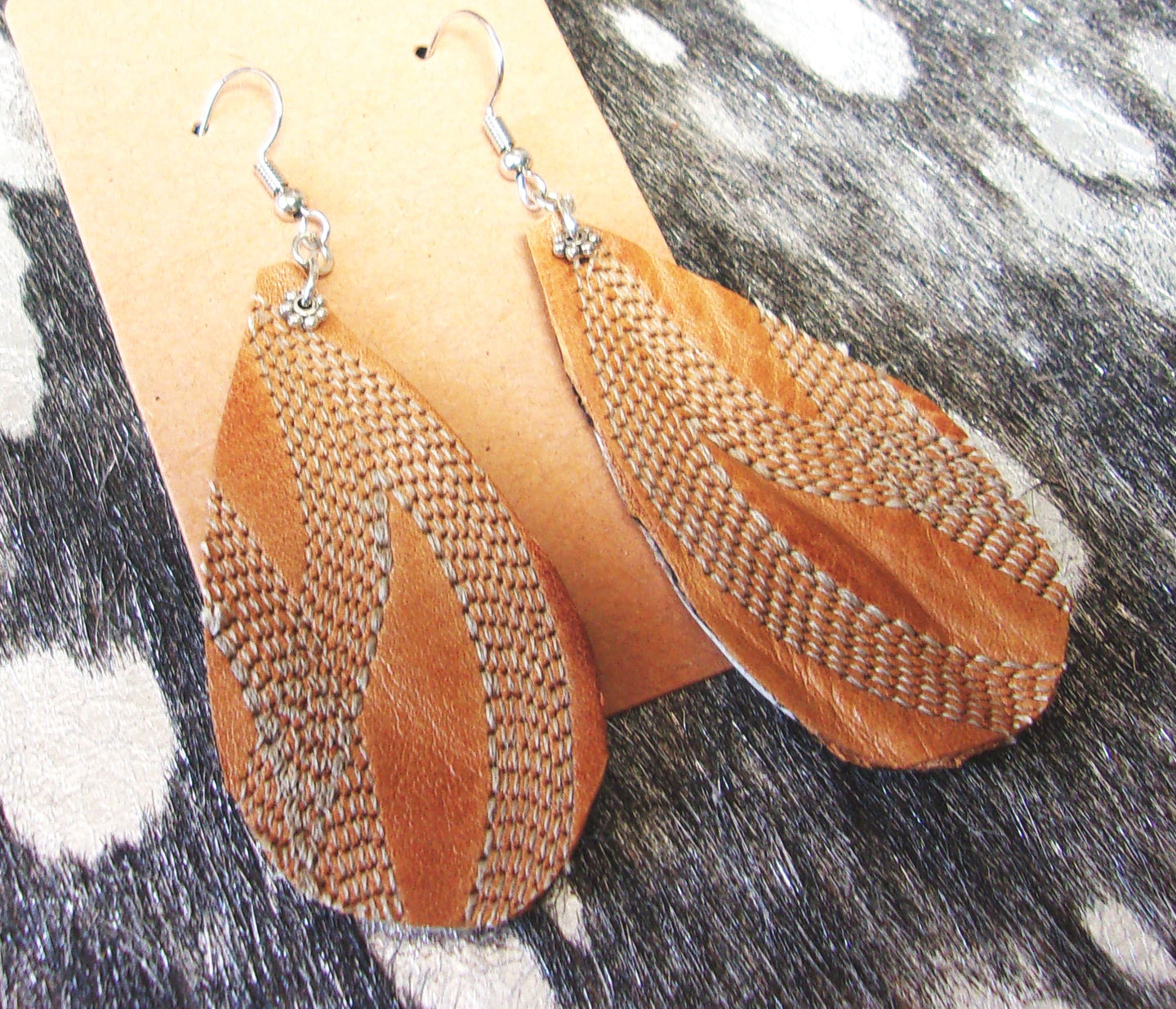 Leather Earrings ER51 handcrafted from cowboy boots. Shop jewelry at and buy the best cowboy boot scraps, cowgirl earrings, eco friendly fashion, hippie earrings, leather earrings, leather jewelry, recycled fashion, sustainable jewelry, unique earrings at Chris Thompson Bags.