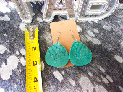 Leather Earrings ER62 handcrafted from cowboy boots. Shop jewelry at and buy the best cowboy boot scraps, cowgirl earrings, eco friendly fashion, hippie earrings, leather earrings, leather jewelry, recycled fashion, sustainable jewelry, unique earrings at Chris Thompson Bags.