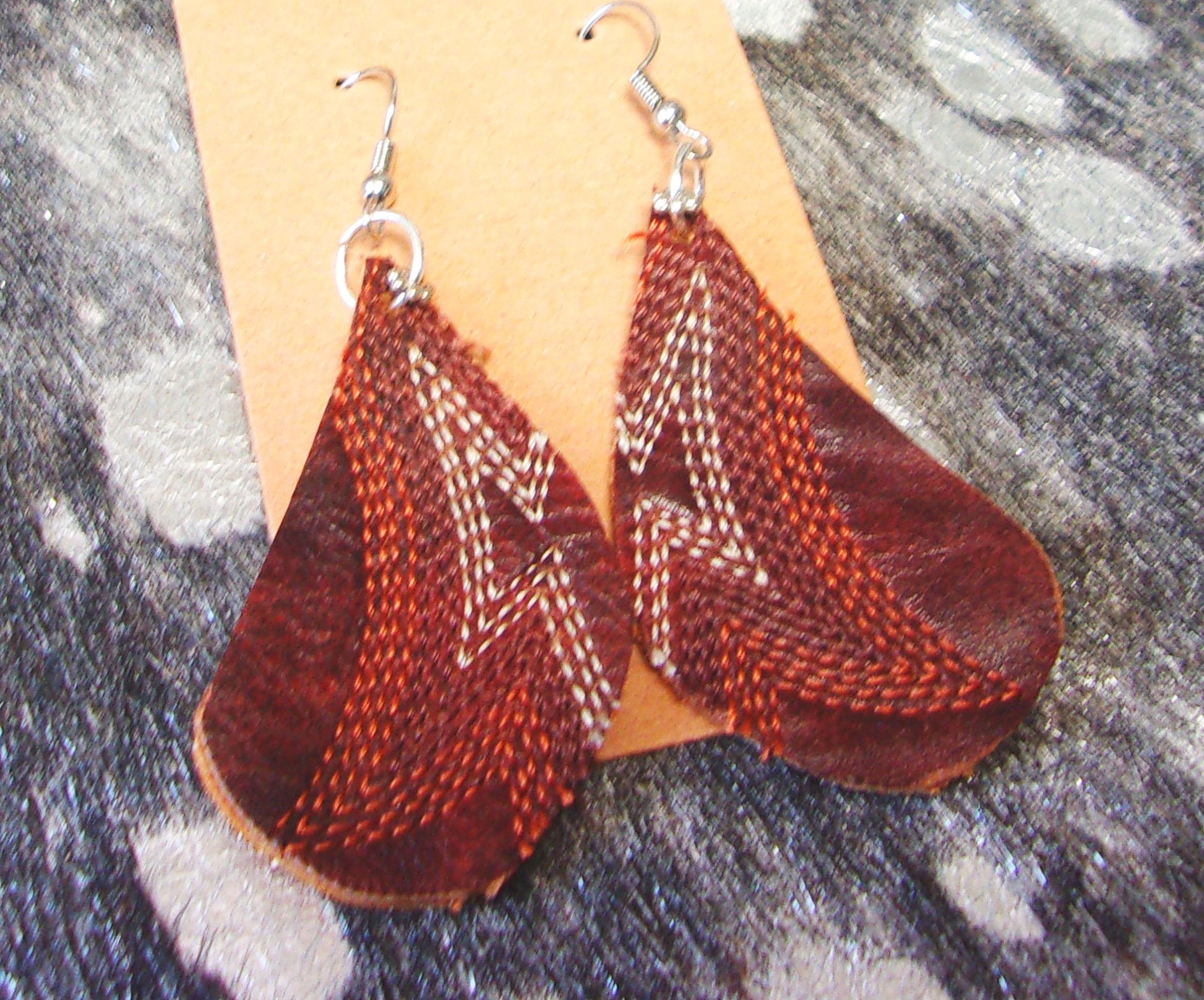 Leather Earrings ER63 handcrafted from cowboy boots. Shop jewelry at and buy the best cowboy boot scraps, cowgirl earrings, eco friendly fashion, hippie earrings, leather earrings, leather jewelry, recycled fashion, sustainable jewelry, unique earrings at Chris Thompson Bags.