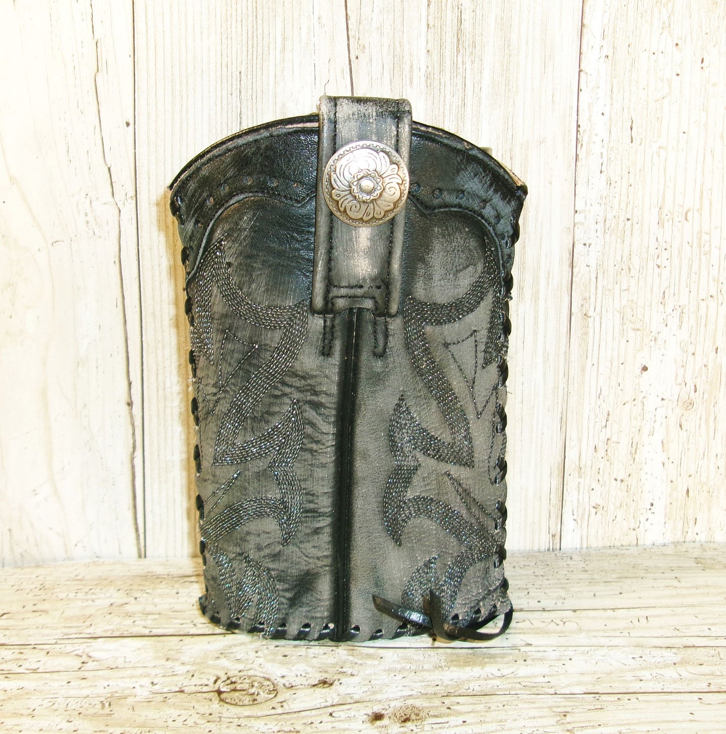 black leather flask