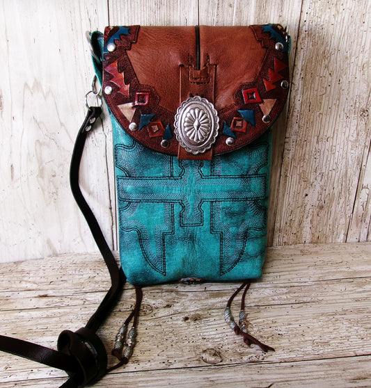 turquoise leather bag with southwest design