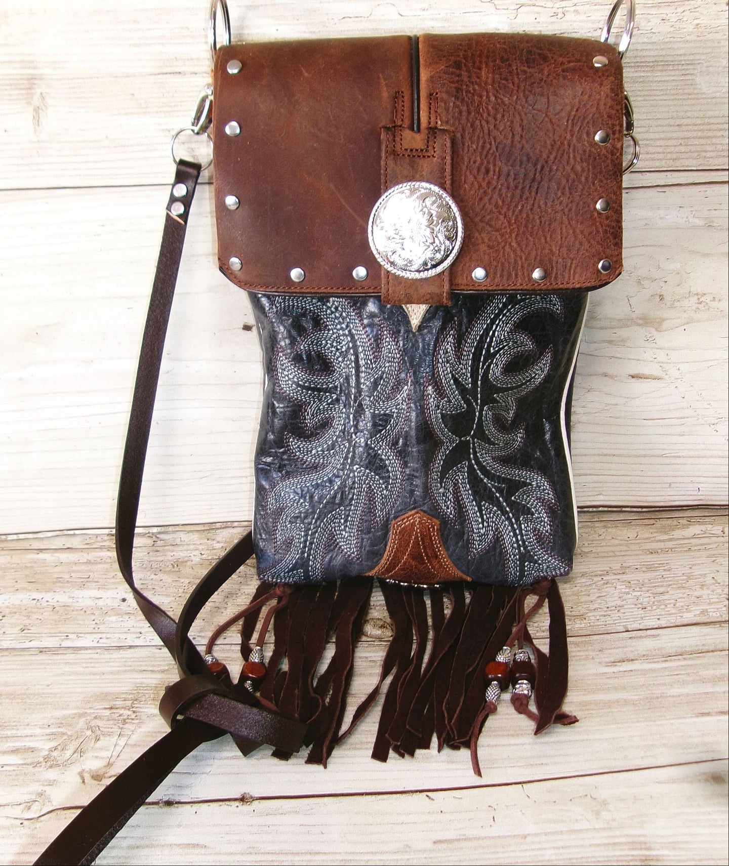 blue and brown boot purse with fringe