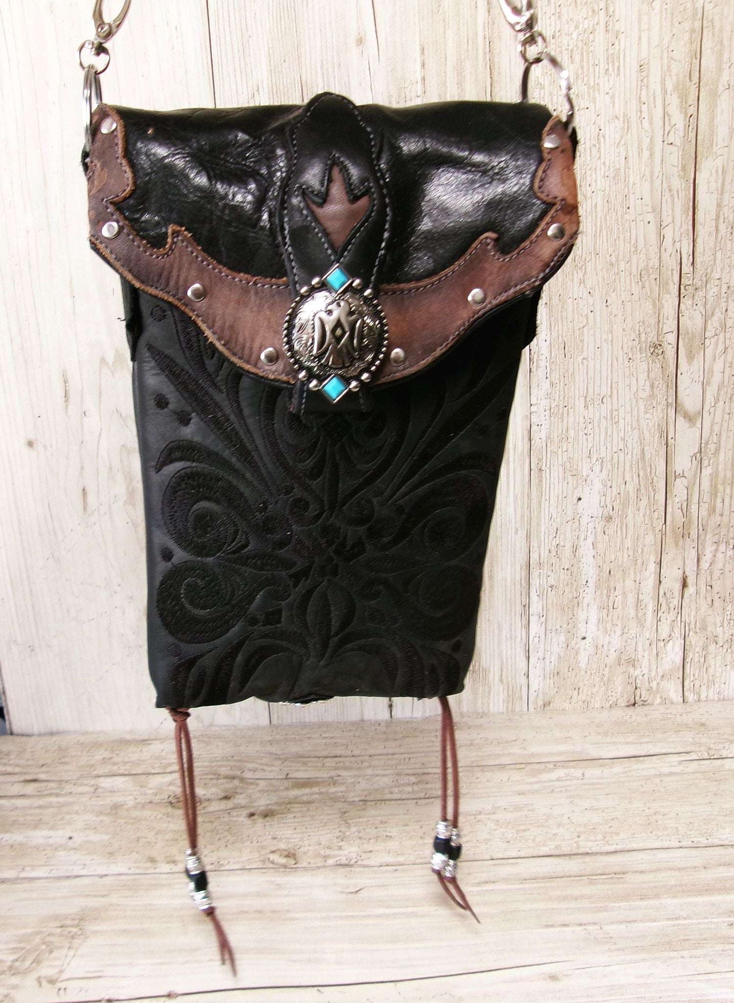 Cowboy Boot Crossbody Hipster Bag HP1122 handcrafted from cowboy boots. Shop Handbags at ChrisThompsonBags.com and buy the best ["Crossbody","fringe","Hipster","phoenix","Small","thunderbird","Turquoise"] at Chris Thompson Bags.