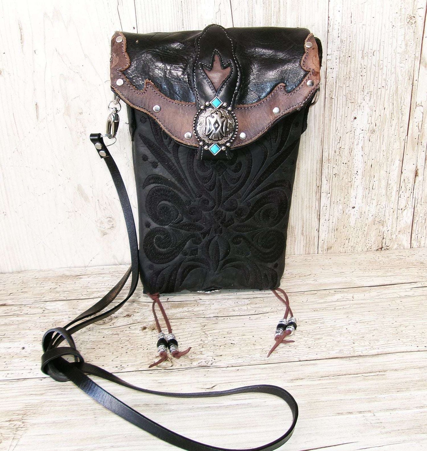 Cowboy Boot Crossbody Hipster Bag HP1122 handcrafted from cowboy boots. Shop Handbags at ChrisThompsonBags.com and buy the best ["Crossbody","fringe","Hipster","phoenix","Small","thunderbird","Turquoise"] at Chris Thompson Bags.