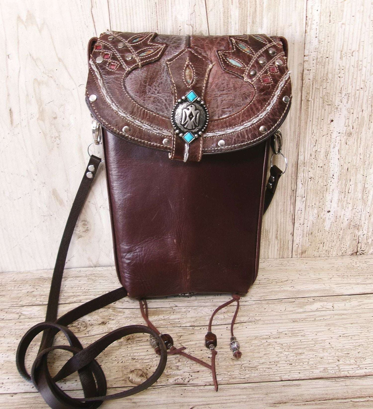 Cowboy Boot Crossbody Hipster Bag HP1123 handcrafted from cowboy boots. Shop Handbags at ChrisThompsonBags.com and buy the best ["Crossbody","fringe","Hipster","phoenix","Small","thunderbird","Turquoise"] at Chris Thompson Bags.
