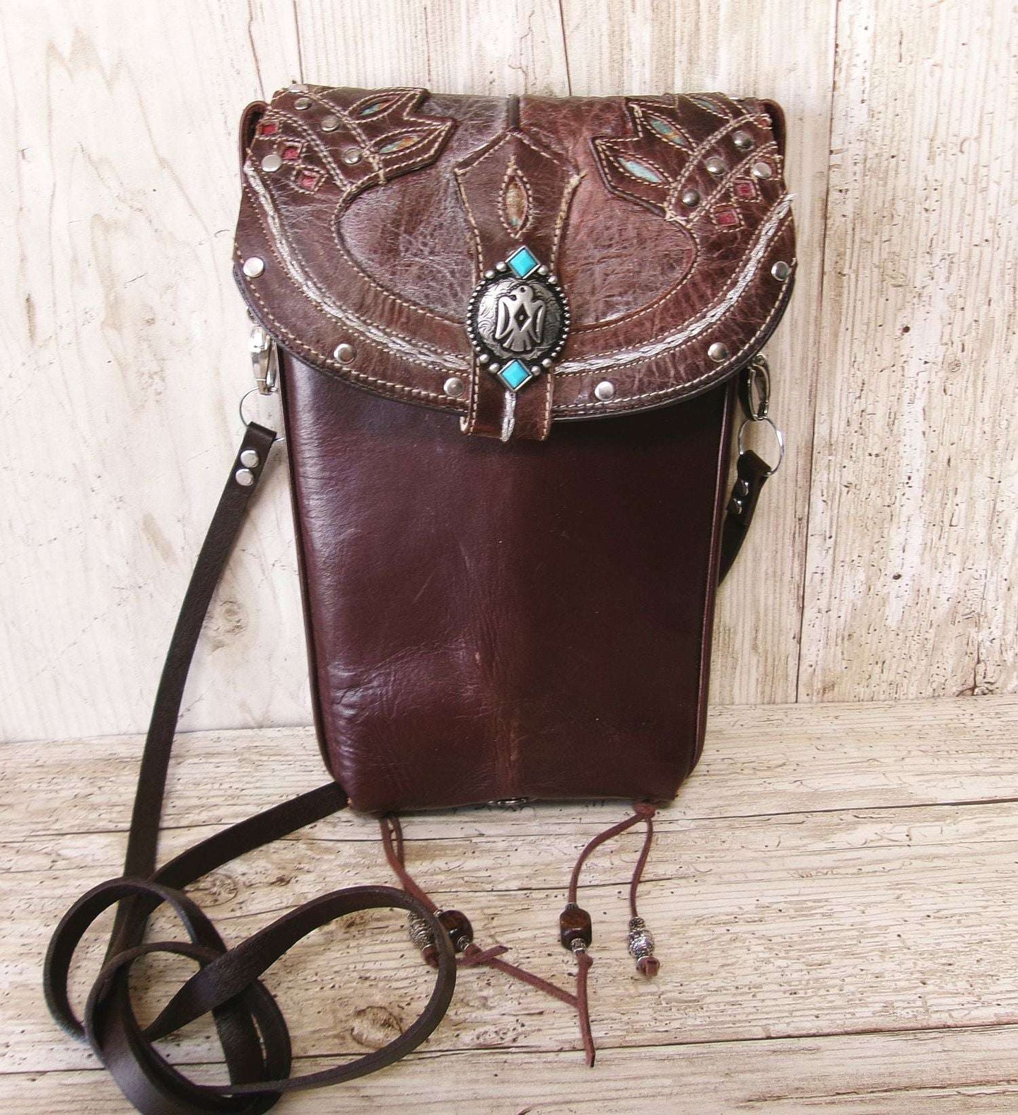 Cowboy Boot Crossbody Hipster Bag HP1123 handcrafted from cowboy boots. Shop Handbags at ChrisThompsonBags.com and buy the best ["Crossbody","fringe","Hipster","phoenix","Small","thunderbird","Turquoise"] at Chris Thompson Bags.