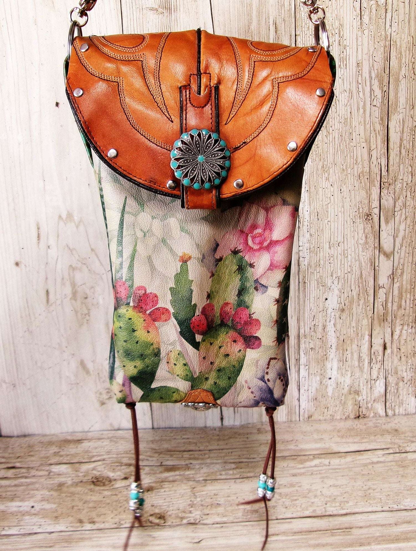 Cowboy Boot Crossbody Hipster Bag HP1124 handcrafted from cowboy boots. Shop Handbags at ChrisThompsonBags.com and buy the best ["cactus","Crossbody","fringe","Hipster","longhorn","Small","Turquoise"] at Chris Thompson Bags.