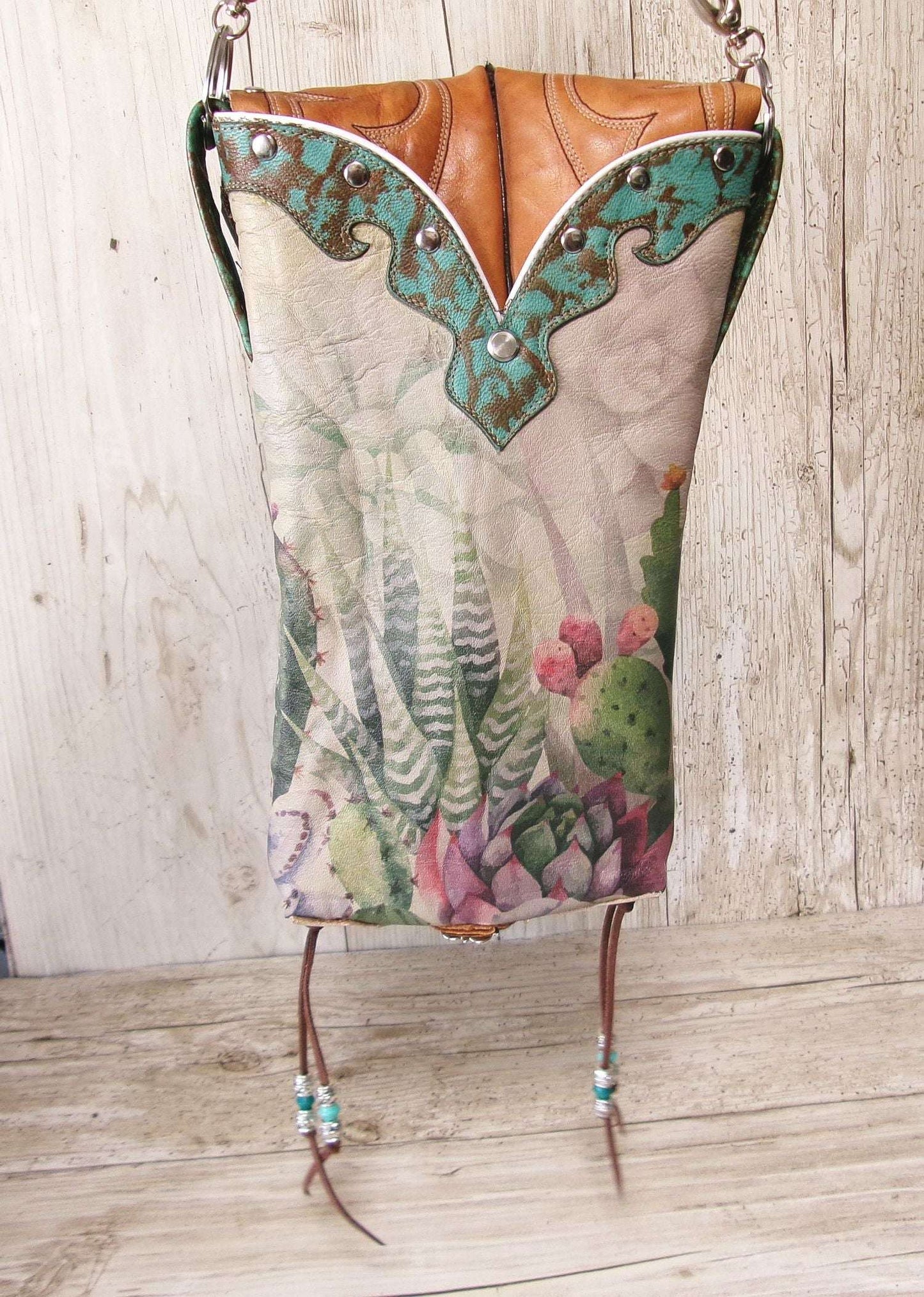 Cowboy Boot Crossbody Hipster Bag HP1124 handcrafted from cowboy boots. Shop Handbags at ChrisThompsonBags.com and buy the best ["cactus","Crossbody","fringe","Hipster","longhorn","Small","Turquoise"] at Chris Thompson Bags.