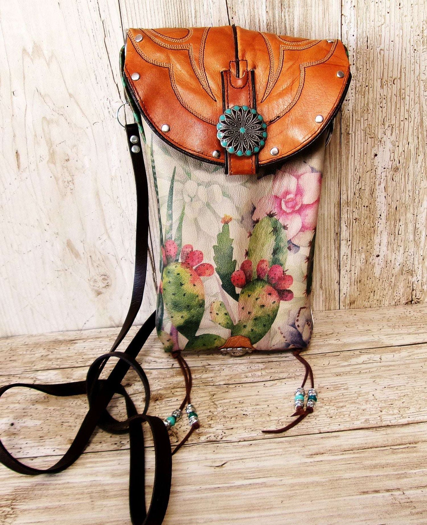 Cowboy Boot Crossbody Hipster Bag HP1124 handcrafted from cowboy boots. Shop Handbags at ChrisThompsonBags.com and buy the best ["cactus","Crossbody","fringe","Hipster","longhorn","Small","Turquoise"] at Chris Thompson Bags.