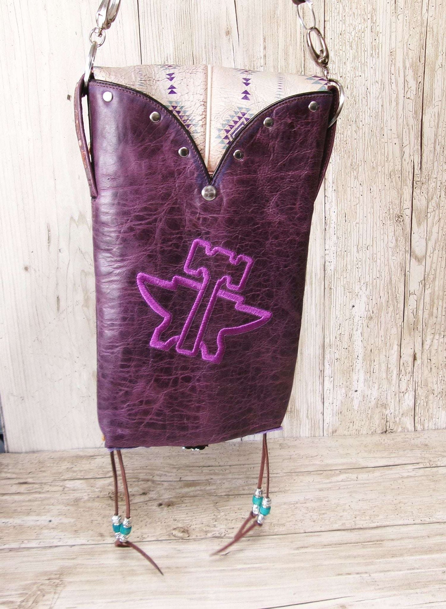 Cowboy Boot Crossbody Hipster Bag HP1125 handcrafted from cowboy boots. Shop Handbags at ChrisThompsonBags.com and buy the best ["Crossbody","fringe","Hipster","phoenix","Small","thunderbird","Turquoise"] at Chris Thompson Bags.