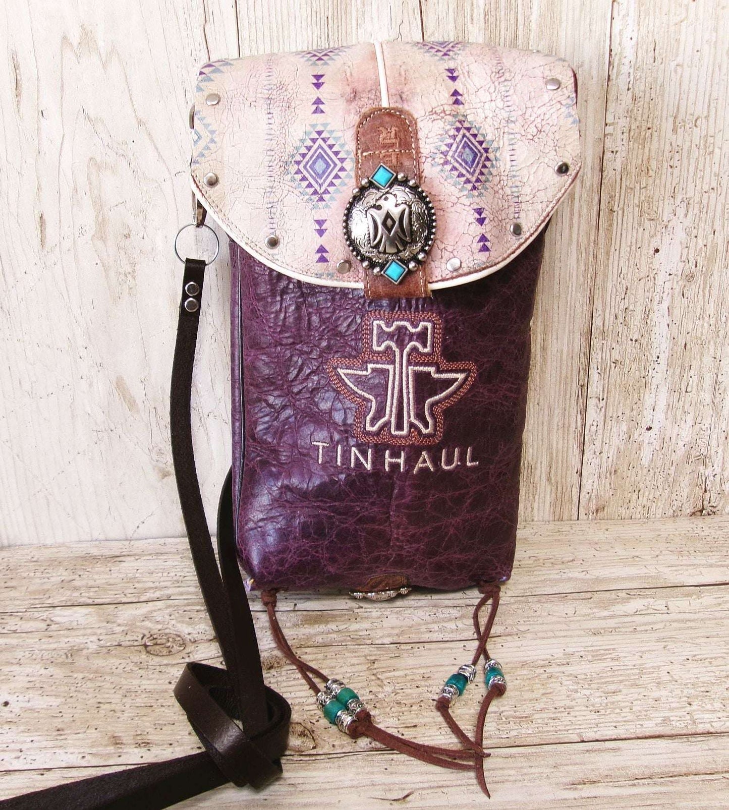 Cowboy Boot Crossbody Hipster Bag HP1125 handcrafted from cowboy boots. Shop Handbags at ChrisThompsonBags.com and buy the best ["Crossbody","fringe","Hipster","phoenix","Small","thunderbird","Turquoise"] at Chris Thompson Bags.
