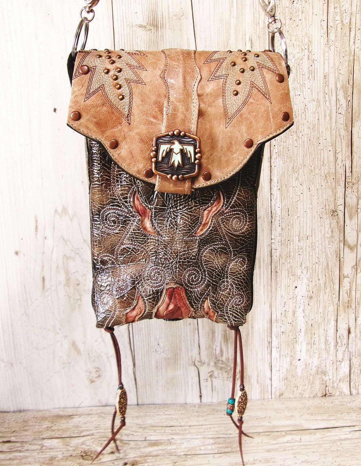 Cowboy Boot Crossbody Hipster Bag HP1128 handcrafted from cowboy boots. Shop Handbags at ChrisThompsonBags.com and buy the best ["Crossbody","fringe","Hipster","phoenix","Small","thunderbird"] at Chris Thompson Bags.