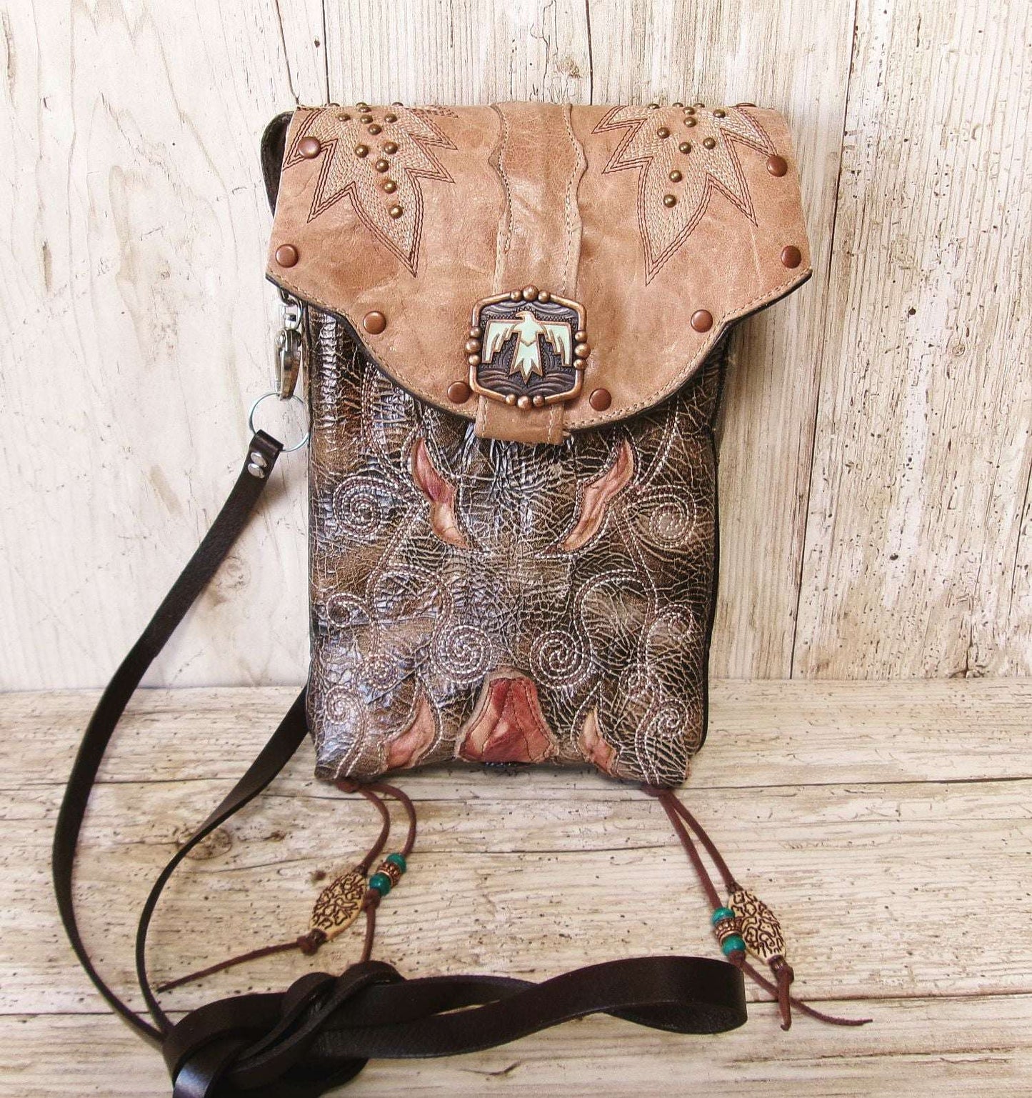 Cowboy Boot Crossbody Hipster Bag HP1128 handcrafted from cowboy boots. Shop Handbags at ChrisThompsonBags.com and buy the best ["Crossbody","fringe","Hipster","phoenix","Small","thunderbird"] at Chris Thompson Bags.