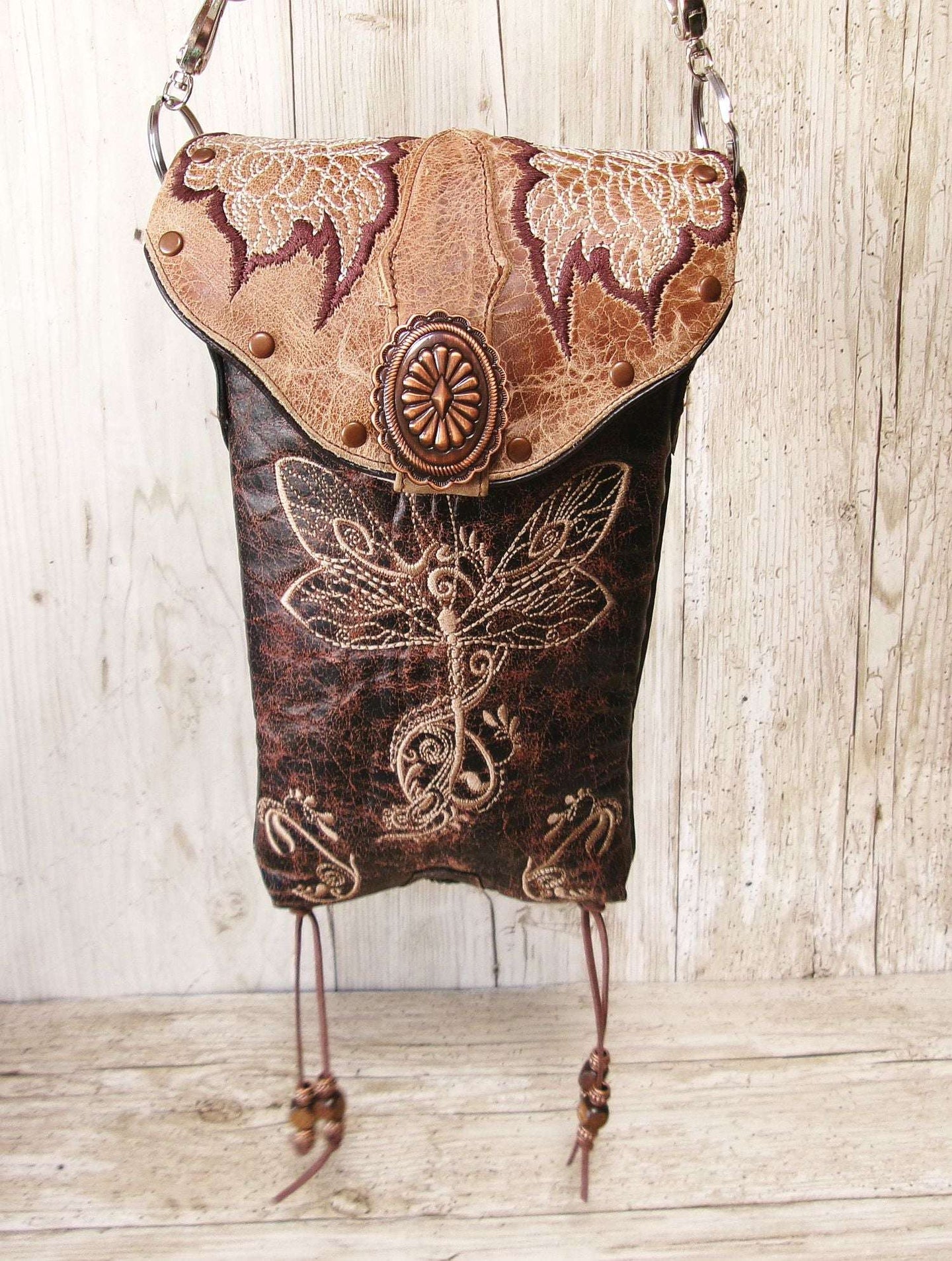 Cowboy Boot Crossbody Hipster Bag HP1129 handcrafted from cowboy boots. Shop Handbags at ChrisThompsonBags.com and buy the best ["Crossbody","dragonfly","fringe","Hipster","Small"] at Chris Thompson Bags.