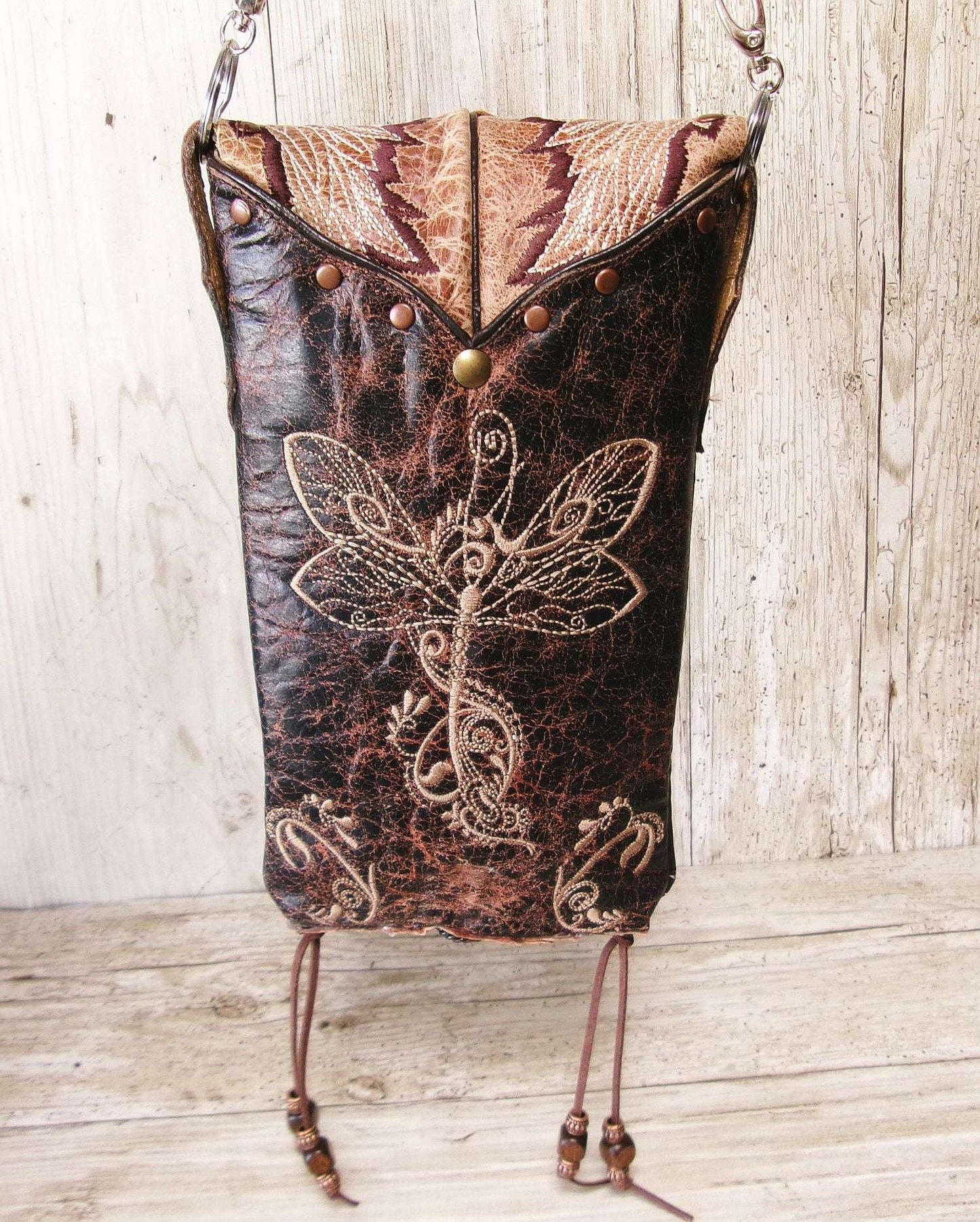 Cowboy Boot Crossbody Hipster Bag HP1129 handcrafted from cowboy boots. Shop Handbags at ChrisThompsonBags.com and buy the best ["Crossbody","dragonfly","fringe","Hipster","Small"] at Chris Thompson Bags.