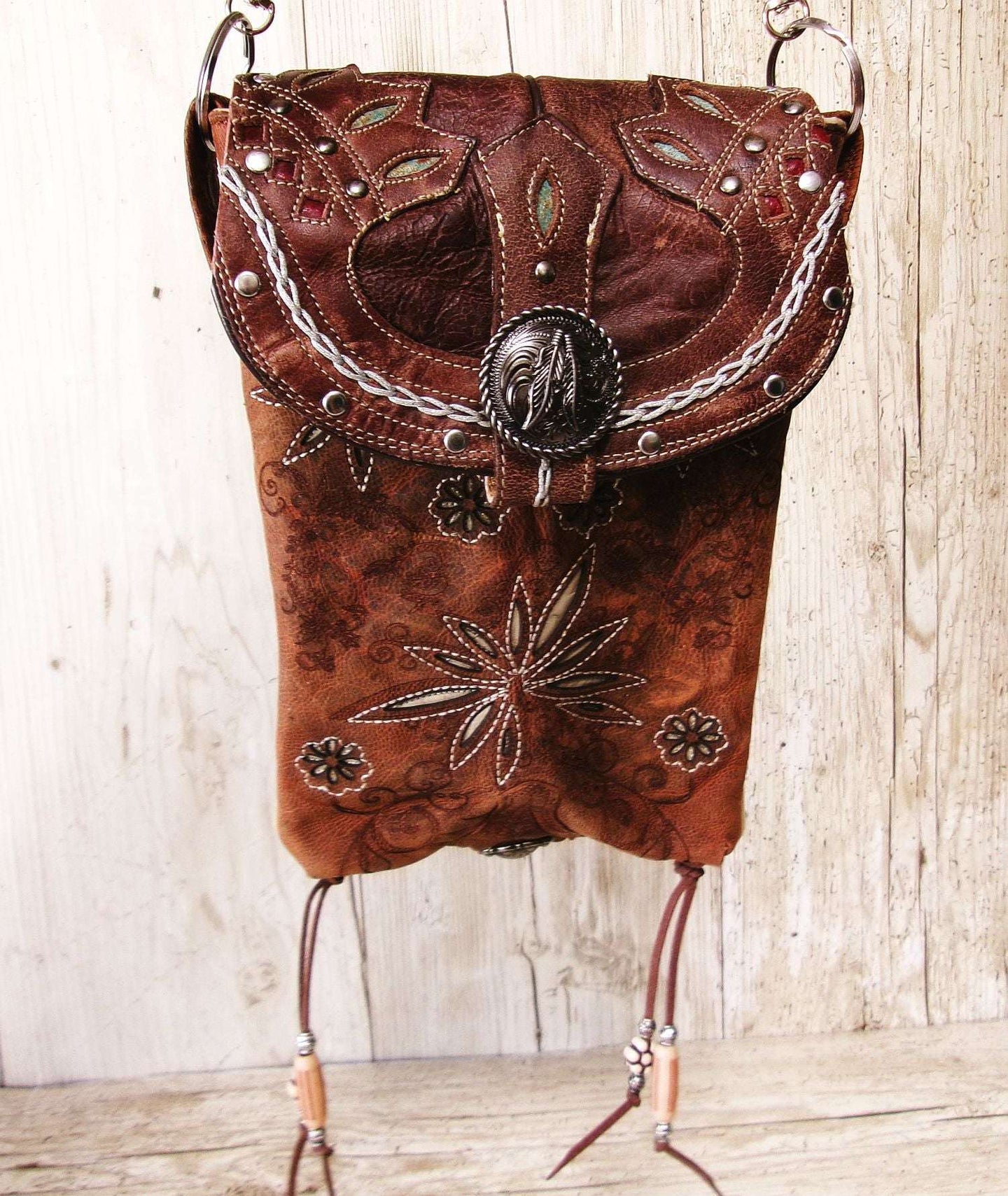 Cowboy Boot Crossbody Hipster Bag HP1131 handcrafted from cowboy boots. Shop Handbags at ChrisThompsonBags.com and buy the best ["Crossbody","feathers","floral","fringe","Hipster","Small"] at Chris Thompson Bags.