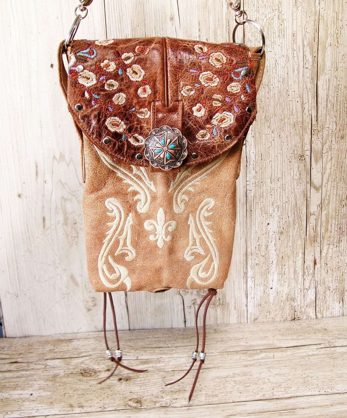 Cowboy Boot Crossbody Hipster Bag HP1132 handcrafted from cowboy boots. Shop Handbags at ChrisThompsonBags.com and buy the best ["Crossbody","floral","fringe","Hipster","Small"] at Chris Thompson Bags.